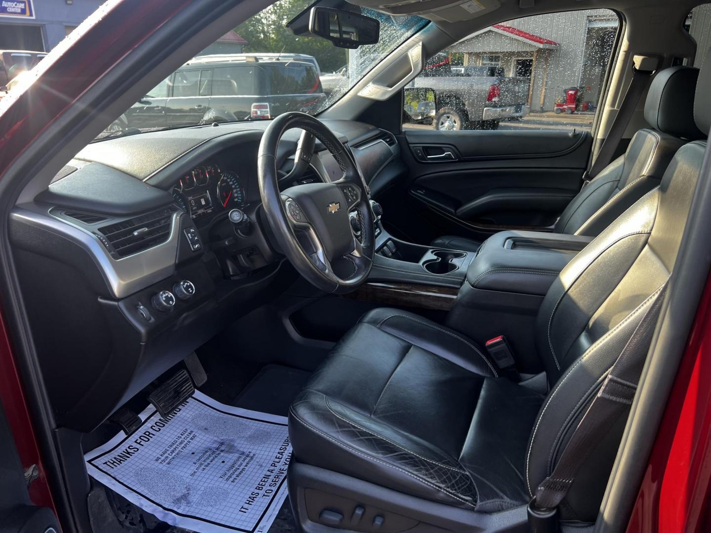 2017 /Black Chevrolet Tahoe LT 4WD (1GNSKBKC2HR) with an 5.3L V8 OHV 16V engine, 6A transmission, located at 547 E. Main St., Orwell, OH, 44076, (440) 437-5893, 41.535435, -80.847855 - This 2016 Chevrolet Tahoe LT 4WD is a well-equipped full-size SUV, powered by a 5.3-liter Vortec V8 engine paired with a 6-speed automatic transmission and offering a towing capacity of 6,200 pounds. It features a luxurious leather interior with comfort and safety features such as rain-sensing wiper - Photo#15