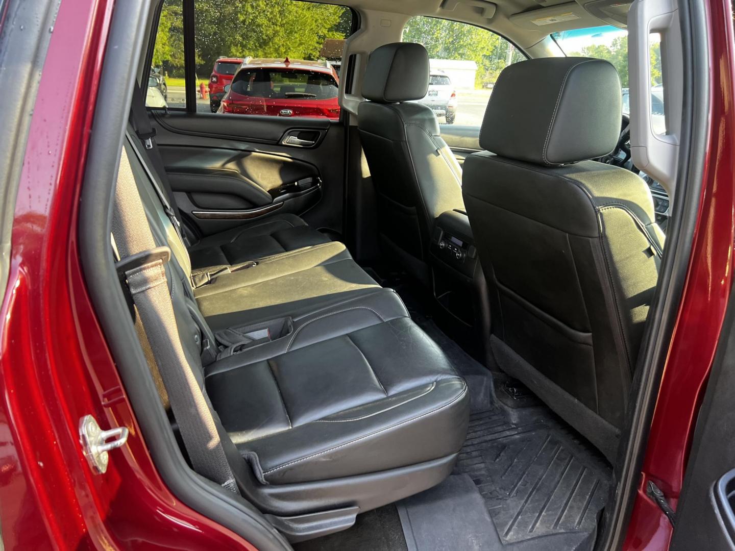 2017 /Black Chevrolet Tahoe LT 4WD (1GNSKBKC2HR) with an 5.3L V8 OHV 16V engine, 6A transmission, located at 547 E. Main St., Orwell, OH, 44076, (440) 437-5893, 41.535435, -80.847855 - This 2016 Chevrolet Tahoe LT 4WD is a well-equipped full-size SUV, powered by a 5.3-liter Vortec V8 engine paired with a 6-speed automatic transmission and offering a towing capacity of 6,200 pounds. It features a luxurious leather interior with comfort and safety features such as rain-sensing wiper - Photo#39