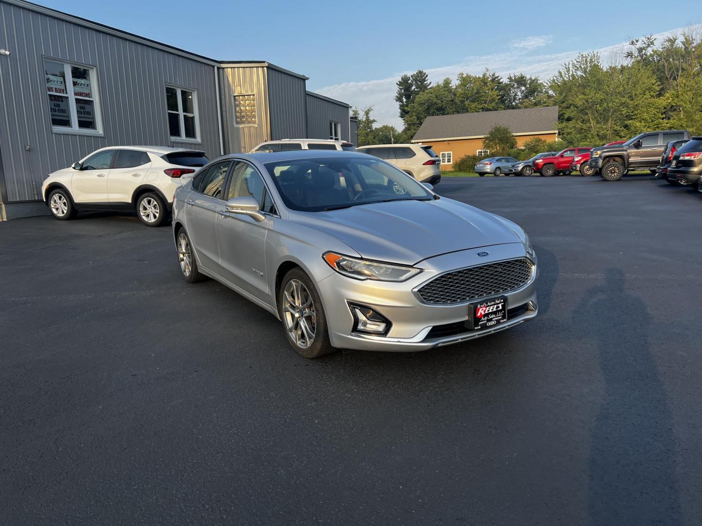 2019 Silver /Black Ford Fusion Hybrid Titanium (3FA6P0RU7KR) with an 2.0L I4 DOHC 16V HYBRID engine, CVT transmission, located at 11115 Chardon Rd. , Chardon, OH, 44024, (440) 214-9705, 41.580246, -81.241943 - This 2019 Ford Fusion Hybrid Titanium is a well-equipped midsize sedan that offers a commendable fuel efficiency of 42 MPG combined. Its exterior features full LED lighting with auto high beams, which enhances visibility and safety. The vehicle is designed with modern driver-assistance technologies - Photo#10