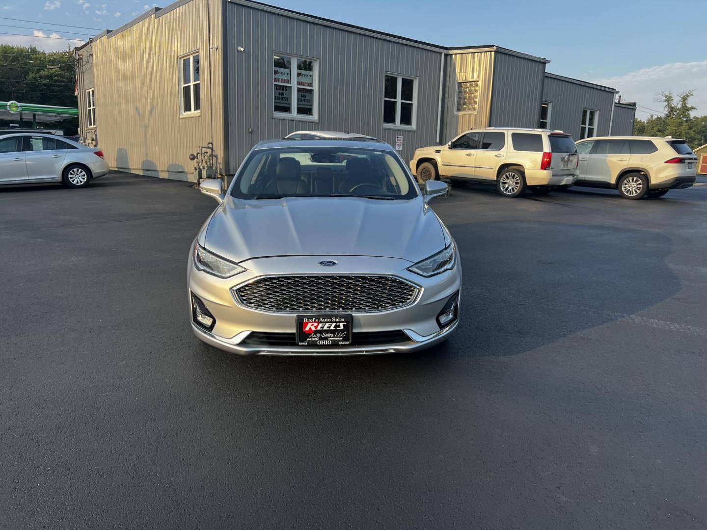 2019 Silver /Black Ford Fusion Hybrid Titanium (3FA6P0RU7KR) with an 2.0L I4 DOHC 16V HYBRID engine, CVT transmission, located at 11115 Chardon Rd. , Chardon, OH, 44024, (440) 214-9705, 41.580246, -81.241943 - This 2019 Ford Fusion Hybrid Titanium is a well-equipped midsize sedan that offers a commendable fuel efficiency of 42 MPG combined. Its exterior features full LED lighting with auto high beams, which enhances visibility and safety. The vehicle is designed with modern driver-assistance technologies - Photo#11