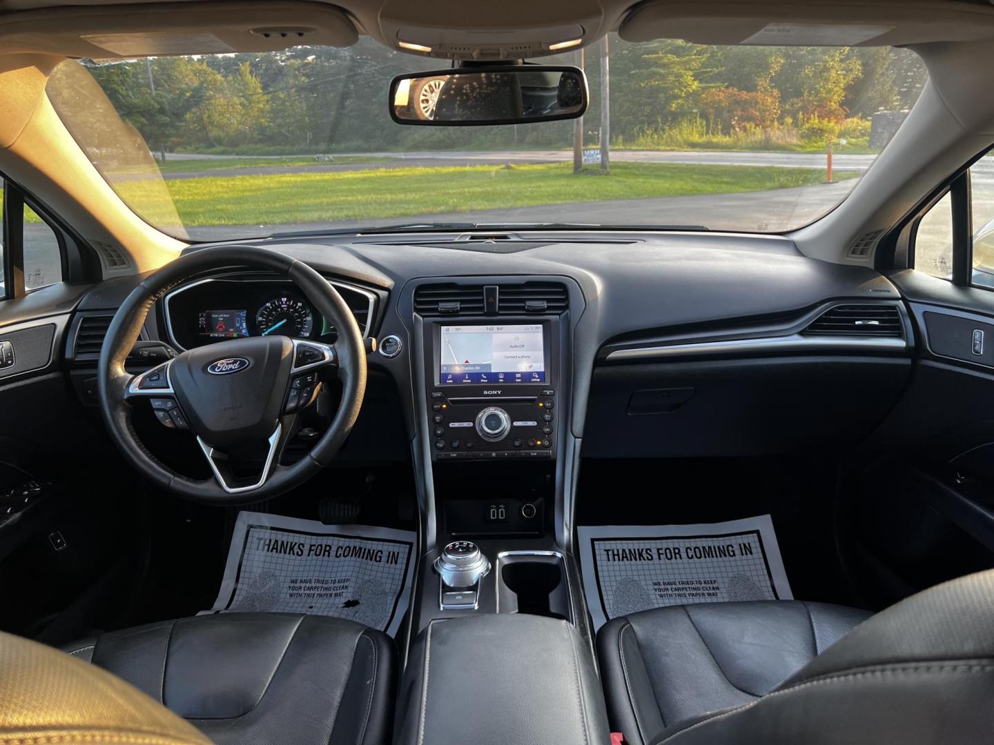 2019 Silver /Black Ford Fusion Hybrid Titanium (3FA6P0RU7KR) with an 2.0L I4 DOHC 16V HYBRID engine, CVT transmission, located at 11115 Chardon Rd. , Chardon, OH, 44024, (440) 214-9705, 41.580246, -81.241943 - This 2019 Ford Fusion Hybrid Titanium is a well-equipped midsize sedan that offers a commendable fuel efficiency of 42 MPG combined. Its exterior features full LED lighting with auto high beams, which enhances visibility and safety. The vehicle is designed with modern driver-assistance technologies - Photo#47