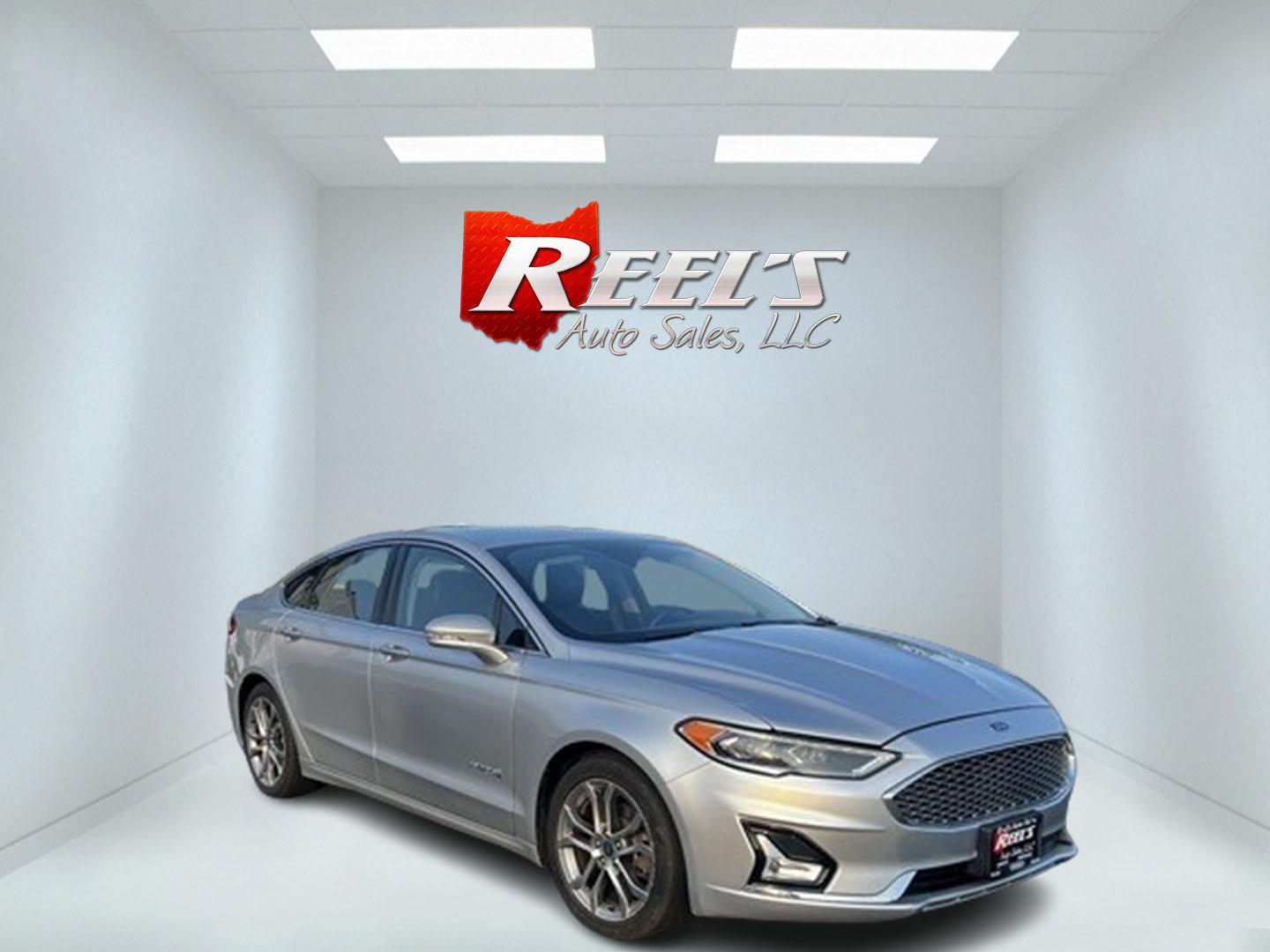 2019 Silver /Black Ford Fusion Hybrid Titanium (3FA6P0RU7KR) with an 2.0L I4 DOHC 16V HYBRID engine, CVT transmission, located at 11115 Chardon Rd. , Chardon, OH, 44024, (440) 214-9705, 41.580246, -81.241943 - This 2019 Ford Fusion Hybrid Titanium is a well-equipped midsize sedan that offers a commendable fuel efficiency of 42 MPG combined. Its exterior features full LED lighting with auto high beams, which enhances visibility and safety. The vehicle is designed with modern driver-assistance technologies - Photo#3