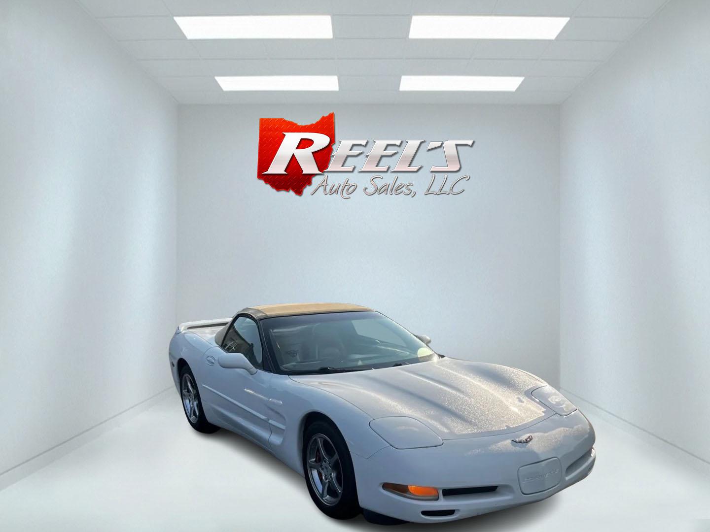 2001 /Tan Chevrolet Corvette Convertible (1G1YY32G815) with an 5.7L V8 OHV 16V engine, 4-Speed Automatic transmission, located at 11115 Chardon Rd. , Chardon, OH, 44024, (440) 214-9705, 41.580246, -81.241943 - This 2001 Chevrolet Corvette is a performance-driven sports car that combines power and comfort elegantly. It is equipped with a robust 5.7L V8 engine that delivers a potent 350 horsepower, enabling impressive acceleration of 0-60 mph in just 5.3 seconds, paired with a 4-speed automatic transmission - Photo#2