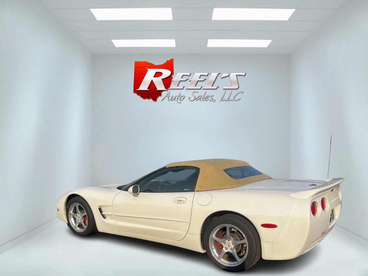 2001 /Tan Chevrolet Corvette Convertible (1G1YY32G815) with an 5.7L V8 OHV 16V engine, 4-Speed Automatic transmission, located at 11115 Chardon Rd. , Chardon, OH, 44024, (440) 214-9705, 41.580246, -81.241943 - This 2001 Chevrolet Corvette is a performance-driven sports car that combines power and comfort elegantly. It is equipped with a robust 5.7L V8 engine that delivers a potent 350 horsepower, enabling impressive acceleration of 0-60 mph in just 5.3 seconds, paired with a 4-speed automatic transmission - Photo#7