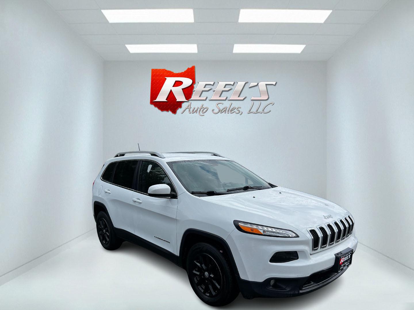 2017 White /Black Jeep Cherokee True North 4WD (1C4PJMCBXHW) with an 2.4L I4 DOHC 16V engine, 9-Speed Automatic transmission, located at 11115 Chardon Rd. , Chardon, OH, 44024, (440) 214-9705, 41.580246, -81.241943 - This 2017 Jeep Cherokee True North is designed for those who value efficiency and comfort in a compact SUV. It features a 2.4-liter I4 PZEV engine with a 9-speed automatic transmission, which together offer a smooth and efficient driving experience, achieving up to 28 MPG on the highway. The 4WD sys - Photo#2