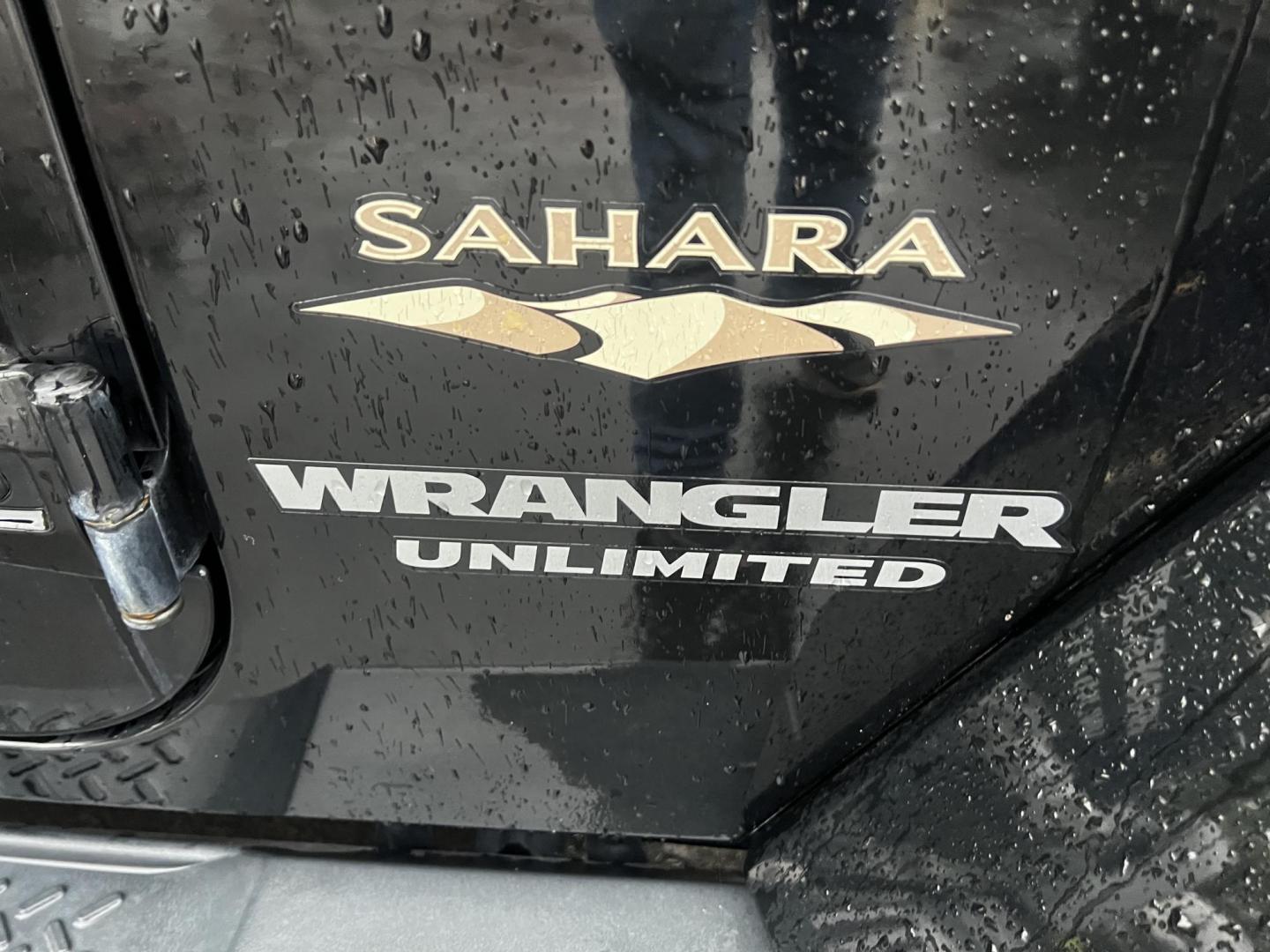 2014 Black /Brown Jeep Wrangler Unlimited Sahara 4WD (1C4BJWEG2EL) with an 3.6L V6 DOHC 24V engine, 5 Speed Auto transmission, located at 547 E. Main St., Orwell, OH, 44076, (440) 437-5893, 41.535435, -80.847855 - This 2014 Jeep Wrangler Unlimited Sahara combines rugged capability with a touch of luxury, catering to adventure enthusiasts who also enjoy comfort. Powered by a 3.6-liter Pentastar V6 engine paired with a 5-speed automatic transmission, it offers robust performance perfect for off-road escapades a - Photo#10