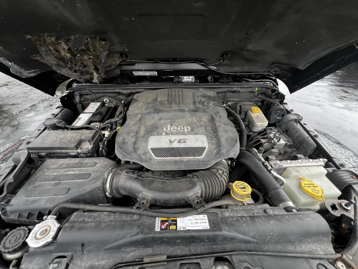 2014 Black /Brown Jeep Wrangler Unlimited Sahara 4WD (1C4BJWEG2EL) with an 3.6L V6 DOHC 24V engine, 5 Speed Auto transmission, located at 547 E. Main St., Orwell, OH, 44076, (440) 437-5893, 41.535435, -80.847855 - This 2014 Jeep Wrangler Unlimited Sahara combines rugged capability with a touch of luxury, catering to adventure enthusiasts who also enjoy comfort. Powered by a 3.6-liter Pentastar V6 engine paired with a 5-speed automatic transmission, it offers robust performance perfect for off-road escapades a - Photo#16