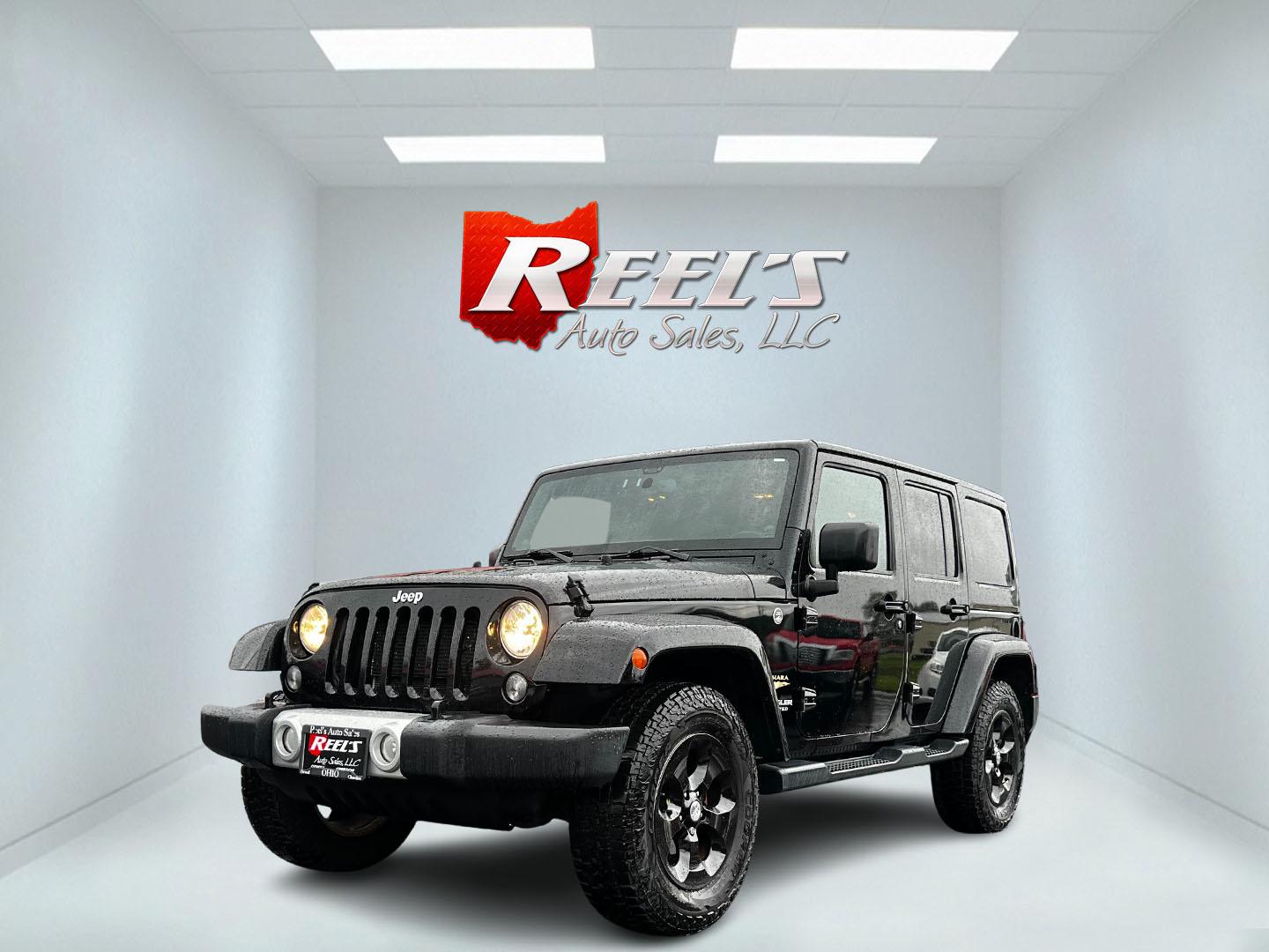 2014 Black /Brown Jeep Wrangler Unlimited Sahara 4WD (1C4BJWEG2EL) with an 3.6L V6 DOHC 24V engine, 5 Speed Auto transmission, located at 547 E. Main St., Orwell, OH, 44076, (440) 437-5893, 41.535435, -80.847855 - This 2014 Jeep Wrangler Unlimited Sahara combines rugged capability with a touch of luxury, catering to adventure enthusiasts who also enjoy comfort. Powered by a 3.6-liter Pentastar V6 engine paired with a 5-speed automatic transmission, it offers robust performance perfect for off-road escapades a - Photo#0