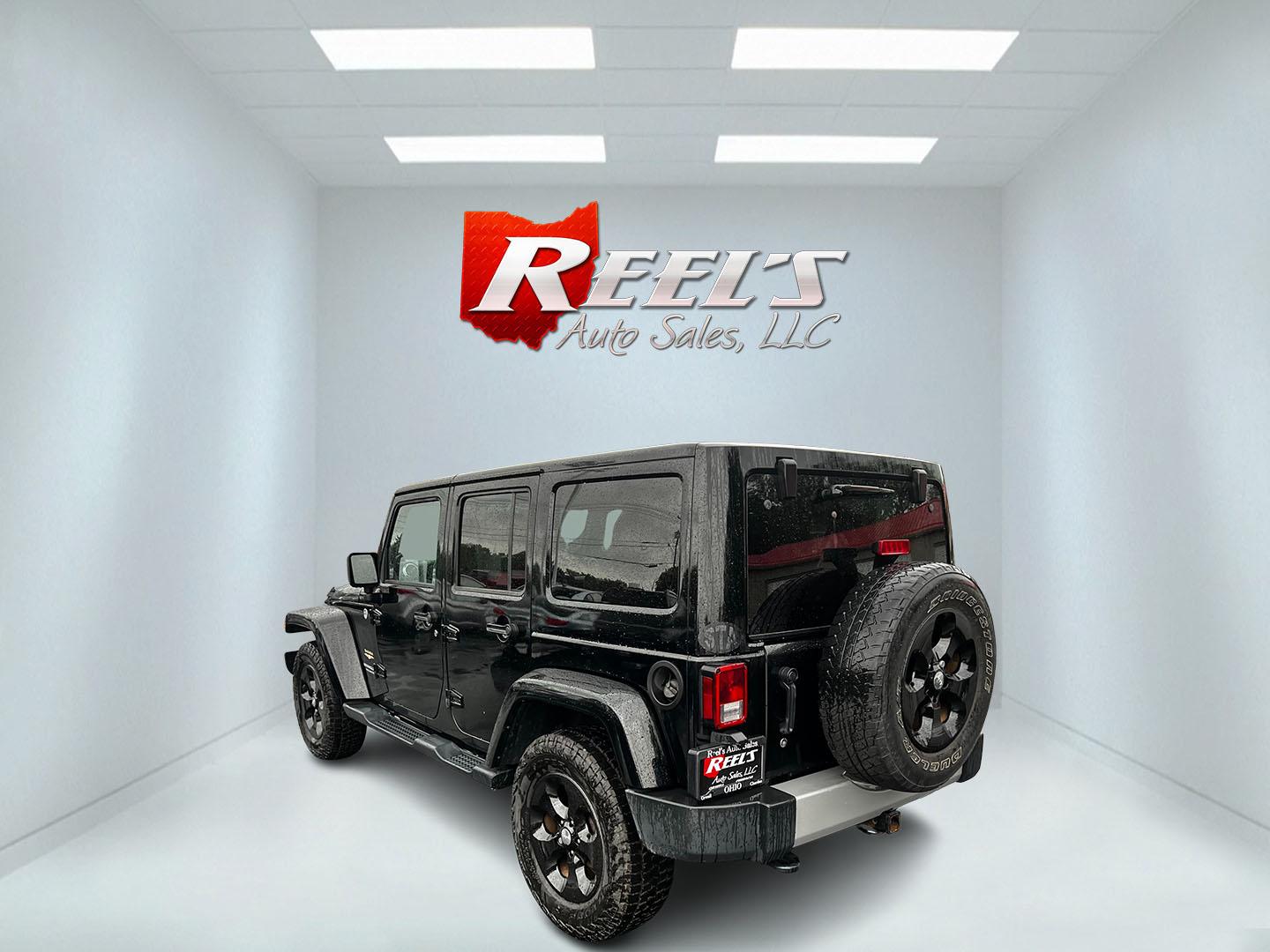 2014 Black /Brown Jeep Wrangler Unlimited Sahara 4WD (1C4BJWEG2EL) with an 3.6L V6 DOHC 24V engine, 5 Speed Auto transmission, located at 547 E. Main St., Orwell, OH, 44076, (440) 437-5893, 41.535435, -80.847855 - This 2014 Jeep Wrangler Unlimited Sahara combines rugged capability with a touch of luxury, catering to adventure enthusiasts who also enjoy comfort. Powered by a 3.6-liter Pentastar V6 engine paired with a 5-speed automatic transmission, it offers robust performance perfect for off-road escapades a - Photo#7