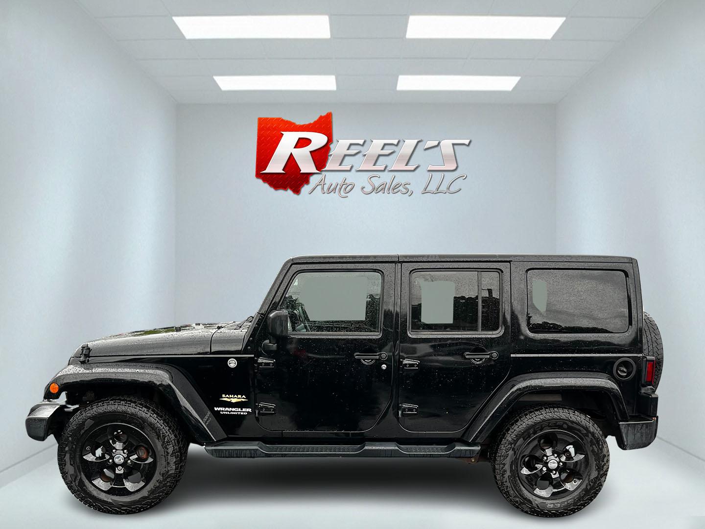 2014 Black /Brown Jeep Wrangler Unlimited Sahara 4WD (1C4BJWEG2EL) with an 3.6L V6 DOHC 24V engine, 5 Speed Auto transmission, located at 547 E. Main St., Orwell, OH, 44076, (440) 437-5893, 41.535435, -80.847855 - This 2014 Jeep Wrangler Unlimited Sahara combines rugged capability with a touch of luxury, catering to adventure enthusiasts who also enjoy comfort. Powered by a 3.6-liter Pentastar V6 engine paired with a 5-speed automatic transmission, it offers robust performance perfect for off-road escapades a - Photo#9