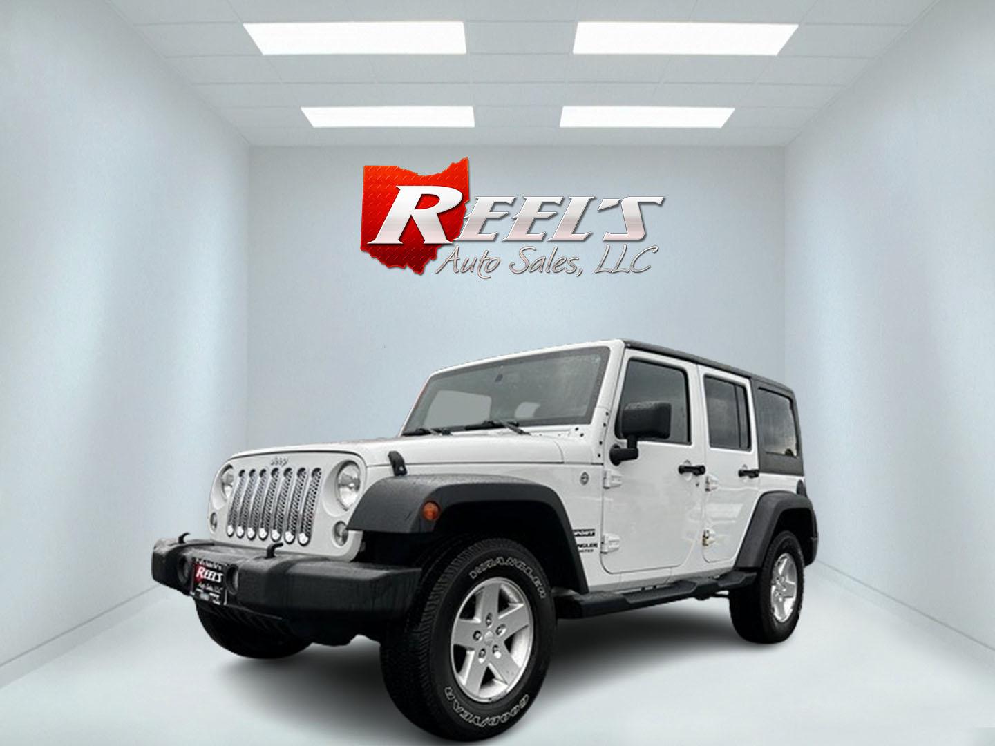 2014 White /Black Jeep Wrangler Unlimited Sport 4WD (1C4BJWDG3EL) with an 3.6L V6 DOHC 24V engine, 5 Speed Auto transmission, located at 547 E. Main St., Orwell, OH, 44076, (440) 437-5893, 41.535435, -80.847855 - This 2014 Jeep Wrangler Unlimited Sport is built for those who enjoy both adventure and practicality, featuring robust off-road capabilities and essential modern features. It's equipped with a 3.6-liter Pentastar V6 engine and a 5-speed automatic transmission, delivering reliable power and performan - Photo#0