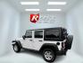 2014 White /Black Jeep Wrangler Unlimited Sport 4WD (1C4BJWDG3EL) with an 3.6L V6 DOHC 24V engine, 5 Speed Auto transmission, located at 547 E. Main St., Orwell, OH, 44076, (440) 437-5893, 41.535435, -80.847855 - This 2014 Jeep Wrangler Unlimited Sport is built for those who enjoy both adventure and practicality, featuring robust off-road capabilities and essential modern features. It's equipped with a 3.6-liter Pentastar V6 engine and a 5-speed automatic transmission, delivering reliable power and performan - Photo#8