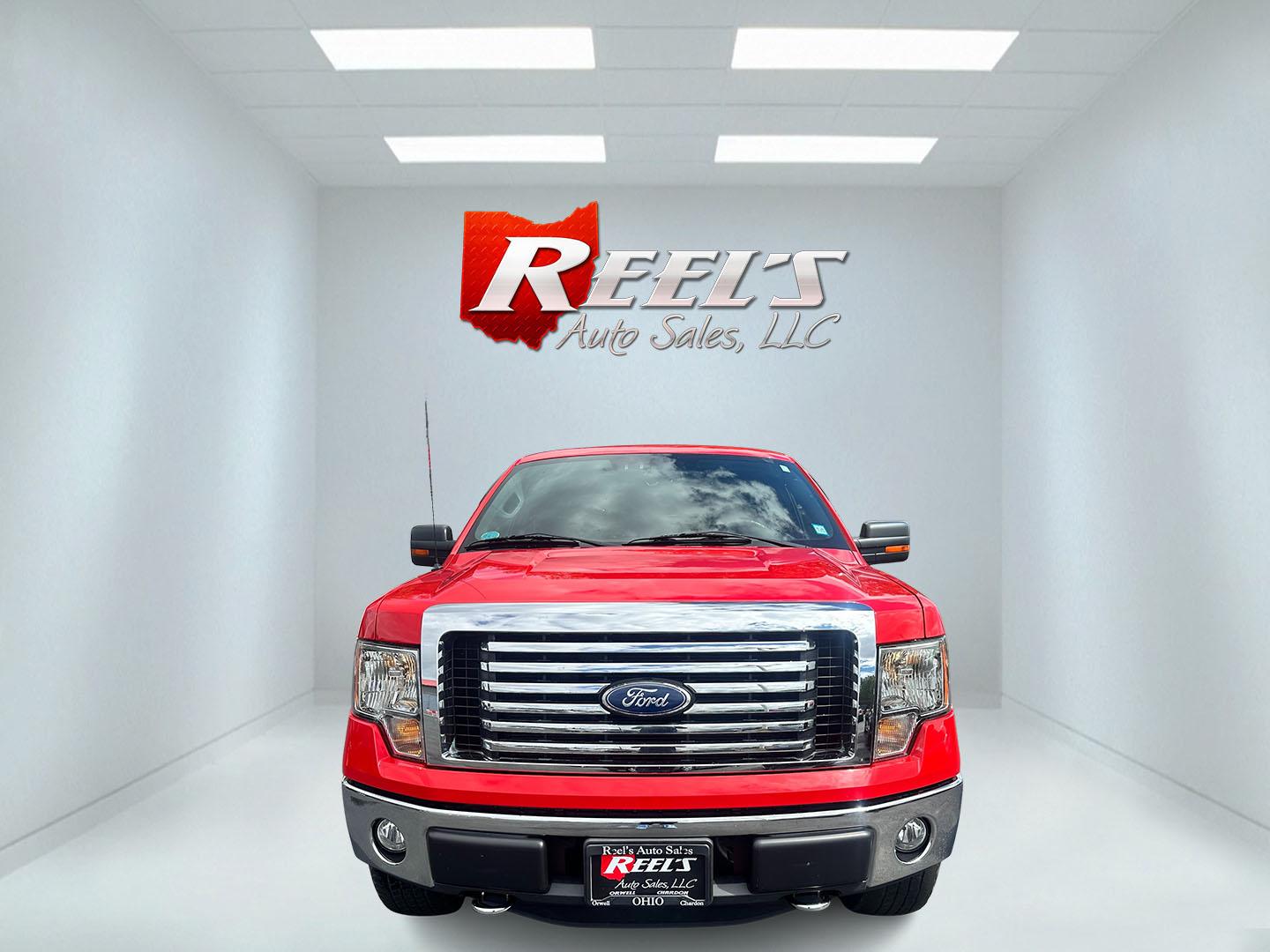 2011 Red /Gray Ford F-150 XLT SuperCab 6.5-ft. Bed 4WD (1FTFX1EF9BF) with an 5.0L V8 engine, 4-Speed Automatic transmission, located at 547 E. Main St., Orwell, OH, 44076, (440) 437-5893, 41.535435, -80.847855 - This 2011 Ford F-150 XLT Super Cab is a rugged and powerful pickup ideal for both work and leisure, equipped with a 5.0-liter Coyote V8 engine delivering 360 horsepower and 380 lb-ft of torque. Its 6-speed automatic transmission ensures smooth driving dynamics, while boasting an impressive towing ca - Photo#1