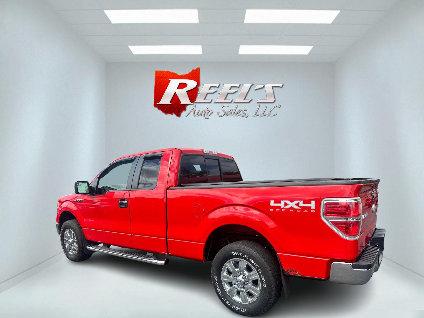 2011 Red /Gray Ford F-150 XLT SuperCab 6.5-ft. Bed 4WD (1FTFX1EF9BF) with an 5.0L V8 engine, 4-Speed Automatic transmission, located at 547 E. Main St., Orwell, OH, 44076, (440) 437-5893, 41.535435, -80.847855 - This 2011 Ford F-150 XLT Super Cab is a rugged and powerful pickup ideal for both work and leisure, equipped with a 5.0-liter Coyote V8 engine delivering 360 horsepower and 380 lb-ft of torque. Its 6-speed automatic transmission ensures smooth driving dynamics, while boasting an impressive towing ca - Photo#8