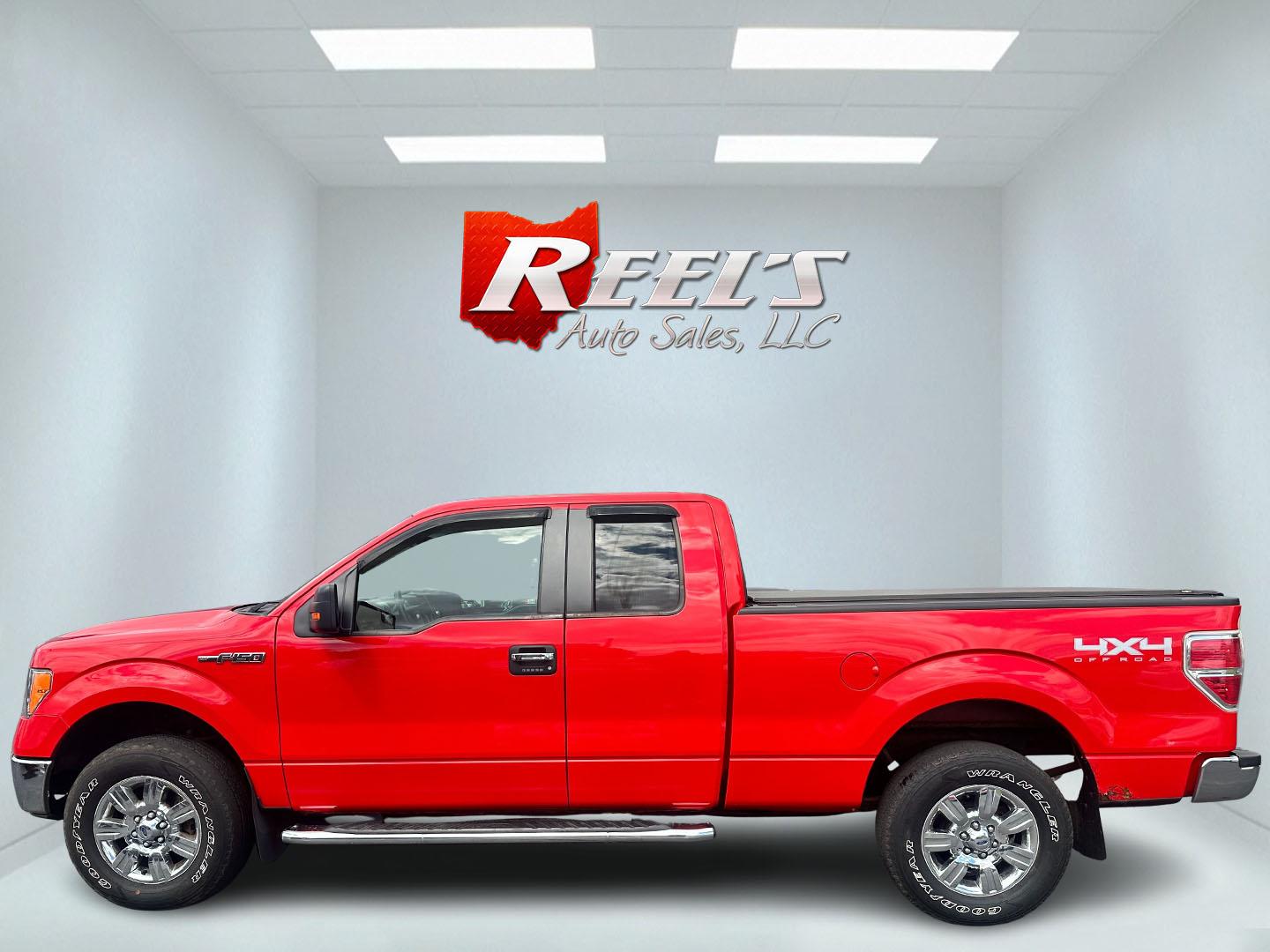 2011 Red /Gray Ford F-150 XLT SuperCab 6.5-ft. Bed 4WD (1FTFX1EF9BF) with an 5.0L V8 engine, 4-Speed Automatic transmission, located at 547 E. Main St., Orwell, OH, 44076, (440) 437-5893, 41.535435, -80.847855 - This 2011 Ford F-150 XLT Super Cab is a rugged and powerful pickup ideal for both work and leisure, equipped with a 5.0-liter Coyote V8 engine delivering 360 horsepower and 380 lb-ft of torque. Its 6-speed automatic transmission ensures smooth driving dynamics, while boasting an impressive towing ca - Photo#9