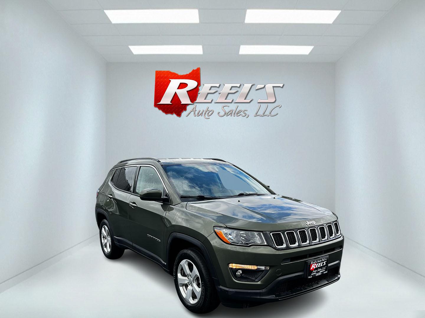 2021 Green /Black Jeep Compass Latitude 4WD (3C4NJDBB8MT) with an 2.4L I4 DOHC 16V engine, 9 Speed Automatic transmission, located at 11115 Chardon Rd. , Chardon, OH, 44024, (440) 214-9705, 41.580246, -81.241943 - This One Owner 2021 Jeep Compass Latitude 4WD is a well-rounded compact SUV that balances performance, technology, and comfort. It is equipped with a 2.4 Multiair I4 engine coupled with a 9-speed automatic transmission, and it offers a Select Terrain System to tackle various driving conditions effec - Photo#2