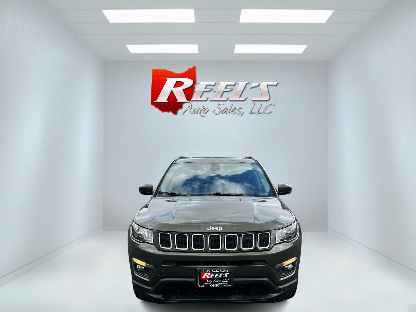 2021 Green /Black Jeep Compass Latitude 4WD (3C4NJDBB8MT) with an 2.4L I4 DOHC 16V engine, 9 Speed Automatic transmission, located at 11115 Chardon Rd. , Chardon, OH, 44024, (440) 214-9705, 41.580246, -81.241943 - This One Owner 2021 Jeep Compass Latitude 4WD is a well-rounded compact SUV that balances performance, technology, and comfort. It is equipped with a 2.4 Multiair I4 engine coupled with a 9-speed automatic transmission, and it offers a Select Terrain System to tackle various driving conditions effec - Photo#1