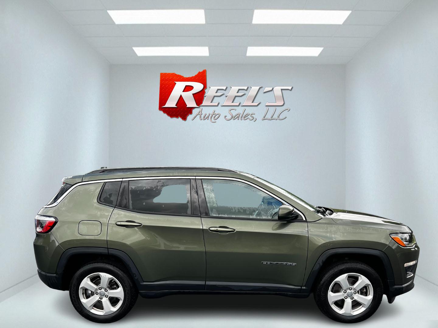 2021 Green /Black Jeep Compass Latitude 4WD (3C4NJDBB8MT) with an 2.4L I4 DOHC 16V engine, 9 Speed Automatic transmission, located at 11115 Chardon Rd. , Chardon, OH, 44024, (440) 214-9705, 41.580246, -81.241943 - This One Owner 2021 Jeep Compass Latitude 4WD is a well-rounded compact SUV that balances performance, technology, and comfort. It is equipped with a 2.4 Multiair I4 engine coupled with a 9-speed automatic transmission, and it offers a Select Terrain System to tackle various driving conditions effec - Photo#4