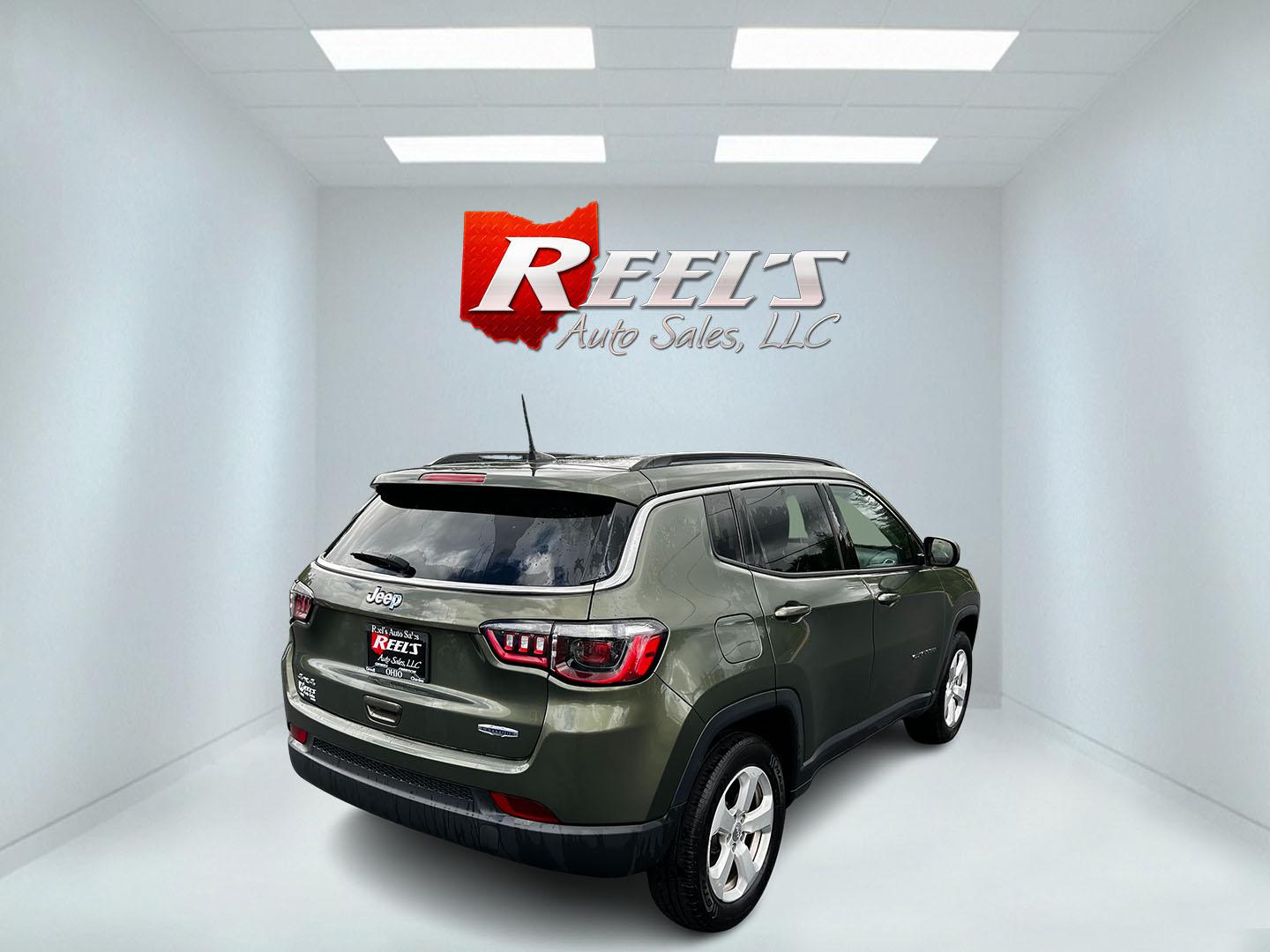 2021 Green /Black Jeep Compass Latitude 4WD (3C4NJDBB8MT) with an 2.4L I4 DOHC 16V engine, 9 Speed Automatic transmission, located at 547 E. Main St., Orwell, OH, 44076, (440) 437-5893, 41.535435, -80.847855 - This One Owner 2021 Jeep Compass Latitude 4WD is a well-rounded compact SUV that balances performance, technology, and comfort. It is equipped with a 2.4 Multiair I4 engine coupled with a 9-speed automatic transmission, and it offers a Select Terrain System to tackle various driving conditions effec - Photo#5