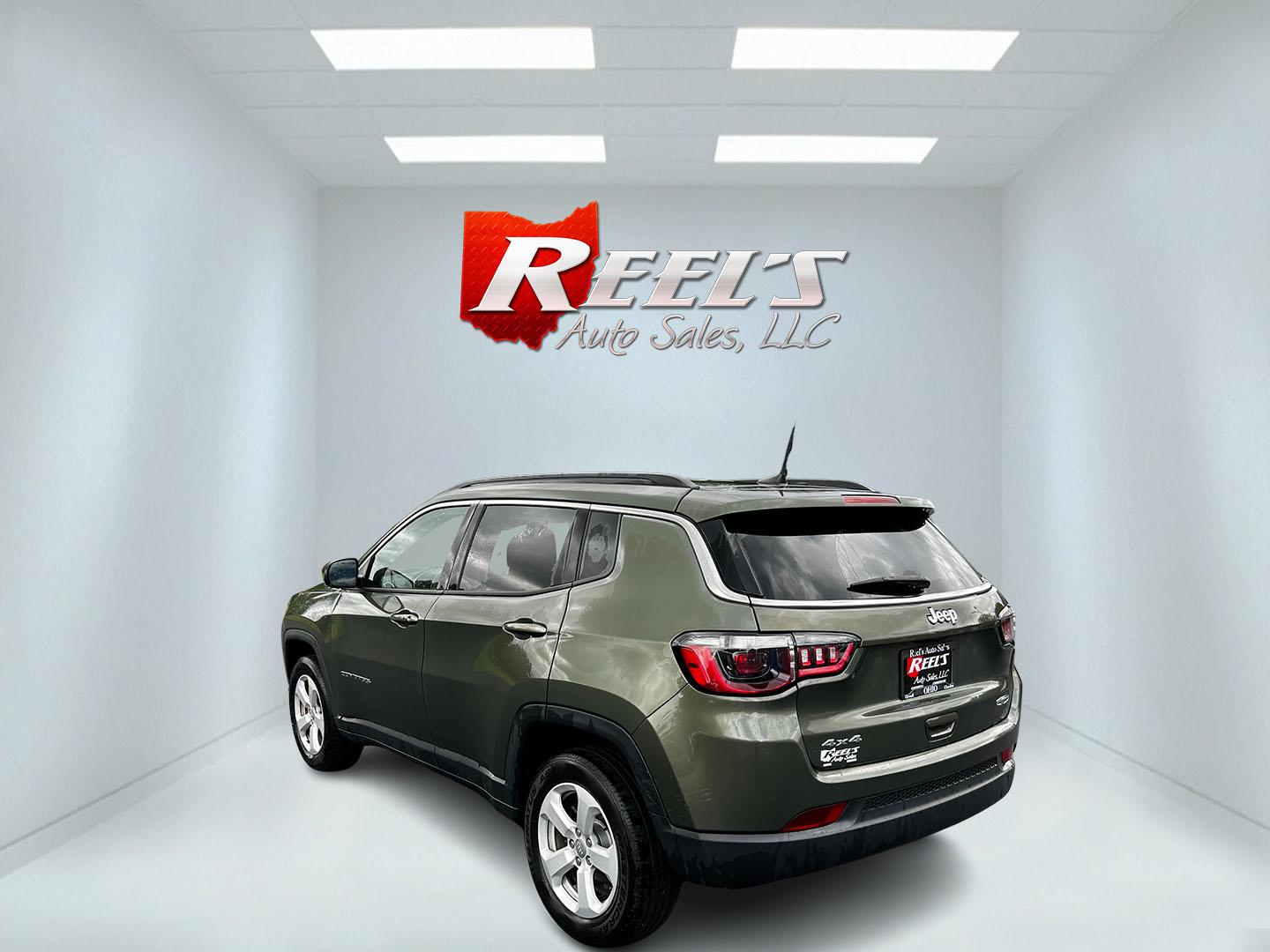 2021 Green /Black Jeep Compass Latitude 4WD (3C4NJDBB8MT) with an 2.4L I4 DOHC 16V engine, 9 Speed Automatic transmission, located at 11115 Chardon Rd. , Chardon, OH, 44024, (440) 214-9705, 41.580246, -81.241943 - This One Owner 2021 Jeep Compass Latitude 4WD is a well-rounded compact SUV that balances performance, technology, and comfort. It is equipped with a 2.4 Multiair I4 engine coupled with a 9-speed automatic transmission, and it offers a Select Terrain System to tackle various driving conditions effec - Photo#7