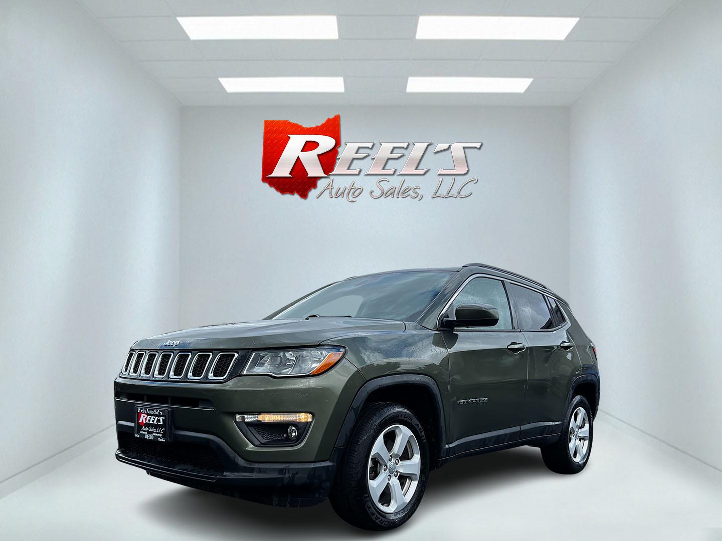 2021 Green /Black Jeep Compass Latitude 4WD (3C4NJDBB8MT) with an 2.4L I4 DOHC 16V engine, 9 Speed Automatic transmission, located at 11115 Chardon Rd. , Chardon, OH, 44024, (440) 214-9705, 41.580246, -81.241943 - This One Owner 2021 Jeep Compass Latitude 4WD is a well-rounded compact SUV that balances performance, technology, and comfort. It is equipped with a 2.4 Multiair I4 engine coupled with a 9-speed automatic transmission, and it offers a Select Terrain System to tackle various driving conditions effec - Photo#0