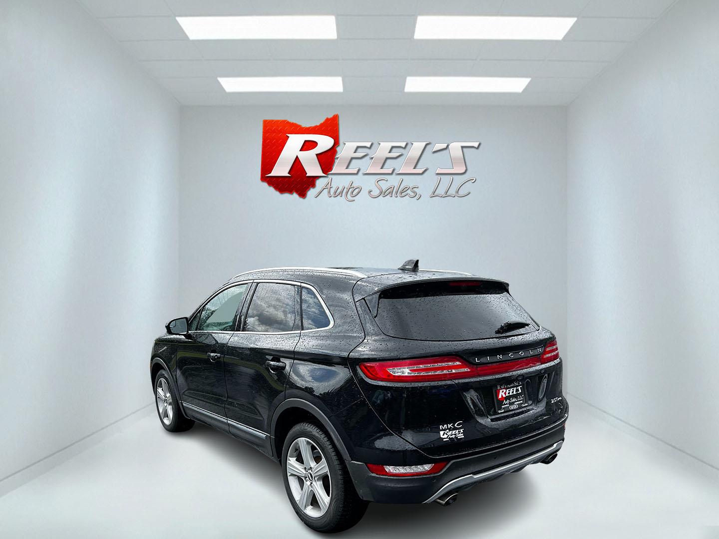 2017 Black /Black Lincoln MKC Premiere AWD (5LMCJ1D98HU) with an 2.0L I4 DOHC 16V Turbo engine, 6 Speed Auto transmission, located at 11115 Chardon Rd. , Chardon, OH, 44024, (440) 214-9705, 41.580246, -81.241943 - Photo#7