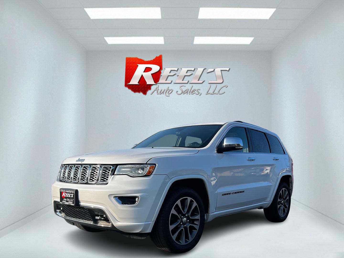 2018 White /Brown Jeep Grand Cherokee Overland 4WD (1C4RJFCGXJC) with an 3.6L V6 DOHC 24V engine, 8A transmission, located at 11115 Chardon Rd. , Chardon, OH, 44024, (440) 214-9705, 41.580246, -81.241943 - Photo#0