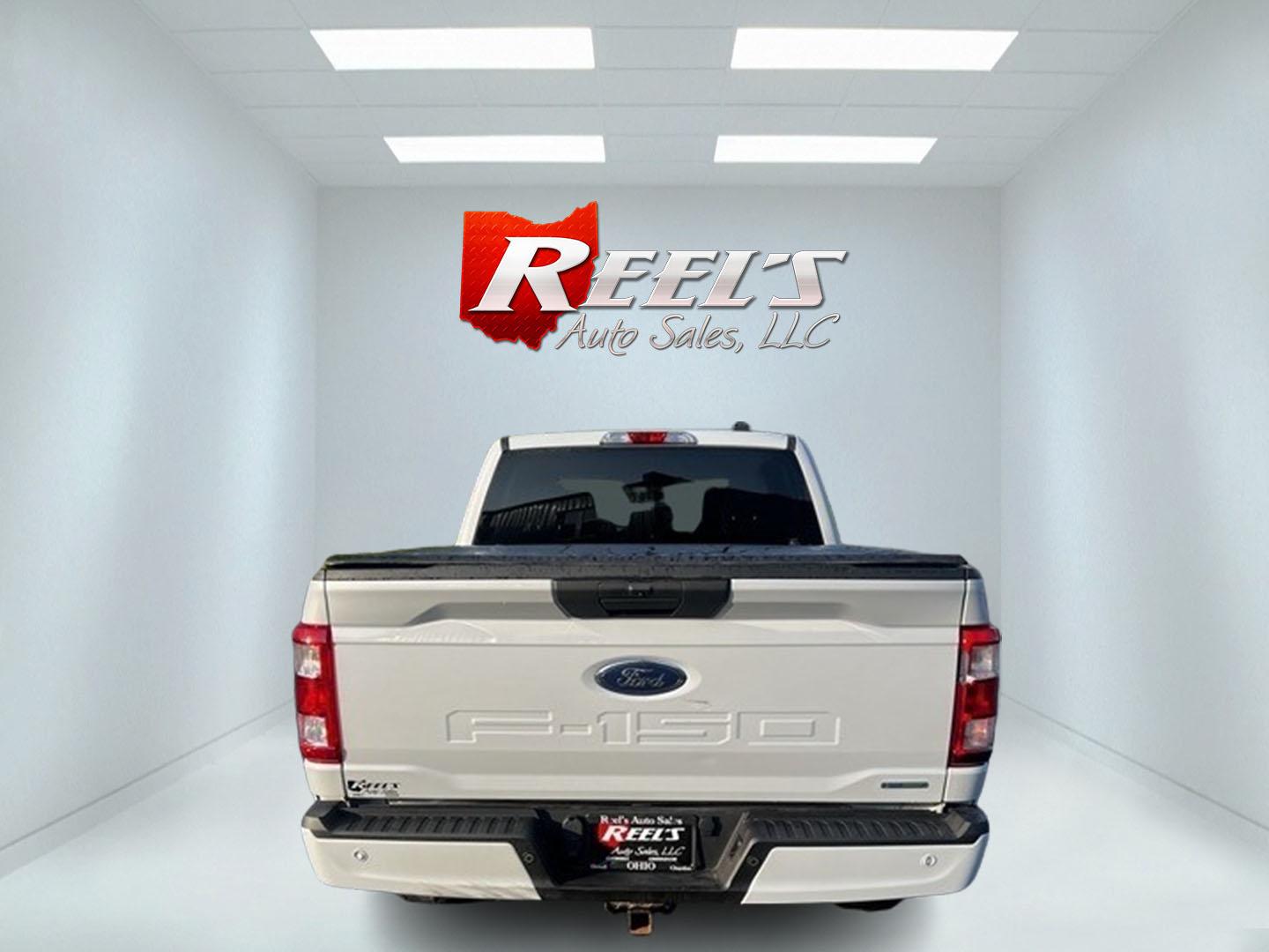 2021 White /Black Ford F-150 STX SuperCrew 5.5-ft. Bed 4WD (1FTEW1EP0MK) with an 2.7L V6 DOHC 24V TWIN TURBO engine, 10 Speed Auto transmission, located at 11115 Chardon Rd. , Chardon, OH, 44024, (440) 214-9705, 41.580246, -81.241943 - This One Owner 2021 Ford F-150 STX Crew Cab 4WD is a well-rounded truck that offers a blend of power, efficiency, and modern technology. Its 2.7-liter Twin Turbo EcoBoost V6 engine produces 325 horsepower and 400 lb-ft of torque, paired with a 10-speed automatic transmission and a 3.55 gearing locki - Photo#5