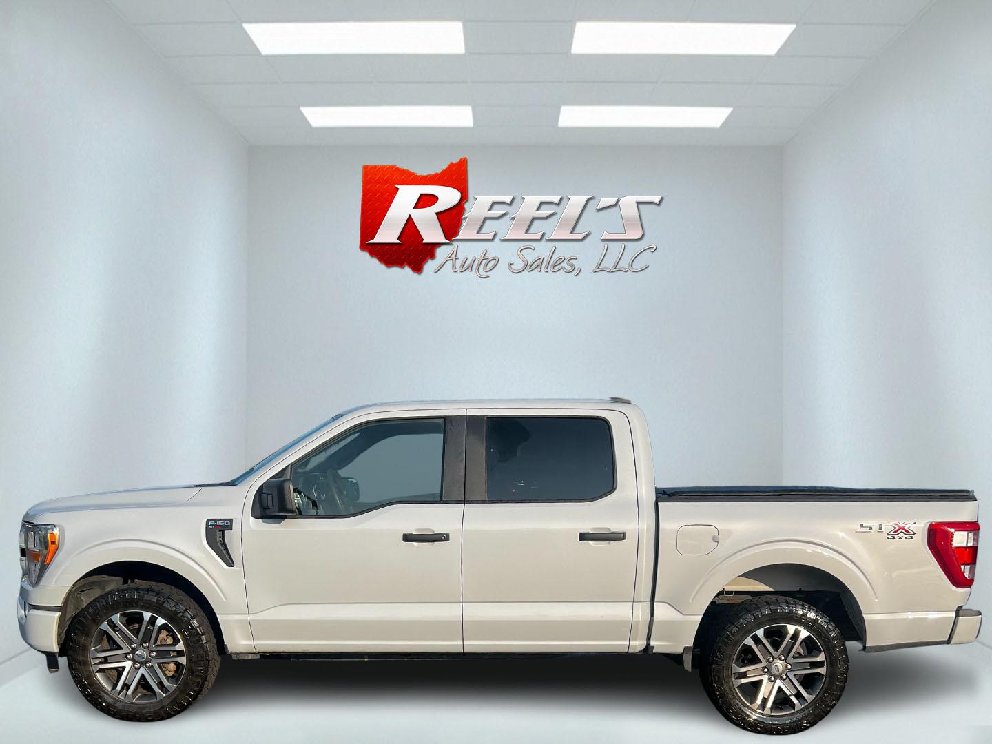 2021 White /Black Ford F-150 STX SuperCrew 5.5-ft. Bed 4WD (1FTEW1EP0MK) with an 2.7L V6 DOHC 24V TWIN TURBO engine, 10 Speed Auto transmission, located at 11115 Chardon Rd. , Chardon, OH, 44024, (440) 214-9705, 41.580246, -81.241943 - This One Owner 2021 Ford F-150 STX Crew Cab 4WD is a well-rounded truck that offers a blend of power, efficiency, and modern technology. Its 2.7-liter Twin Turbo EcoBoost V6 engine produces 325 horsepower and 400 lb-ft of torque, paired with a 10-speed automatic transmission and a 3.55 gearing locki - Photo#8