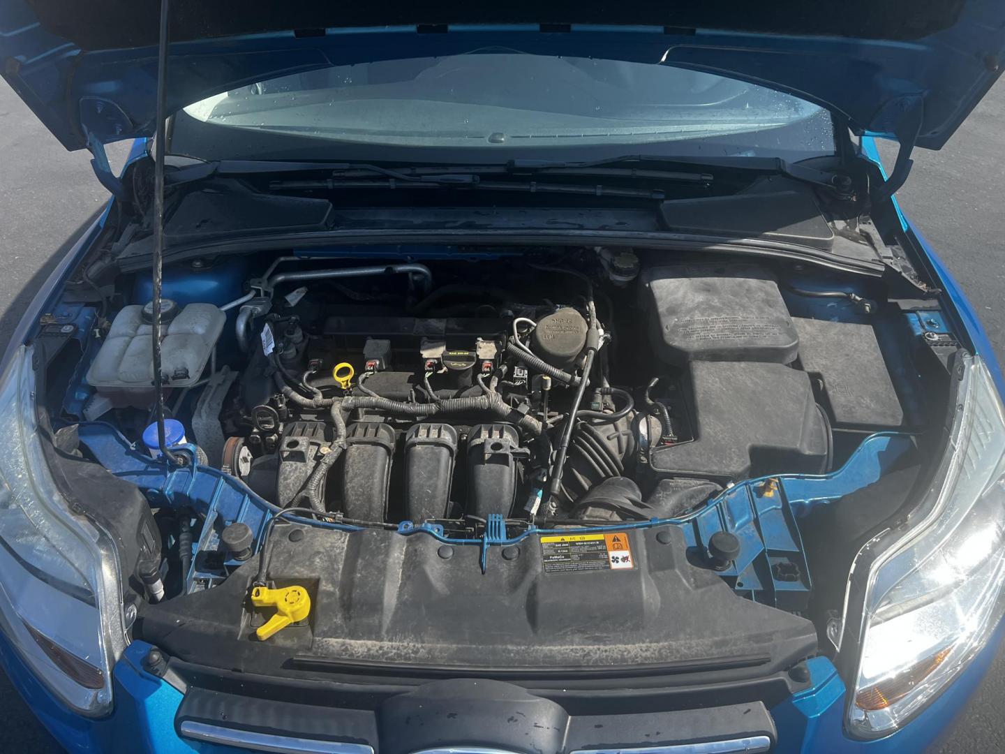 2013 Blue /Black Ford Focus SE Sedan (1FADP3F29DL) with an 2.0L I4 DOHC 16V engine, 6-Speed Automatic transmission, located at 547 E. Main St., Orwell, OH, 44076, (440) 437-5893, 41.535435, -80.847855 - Photo#14