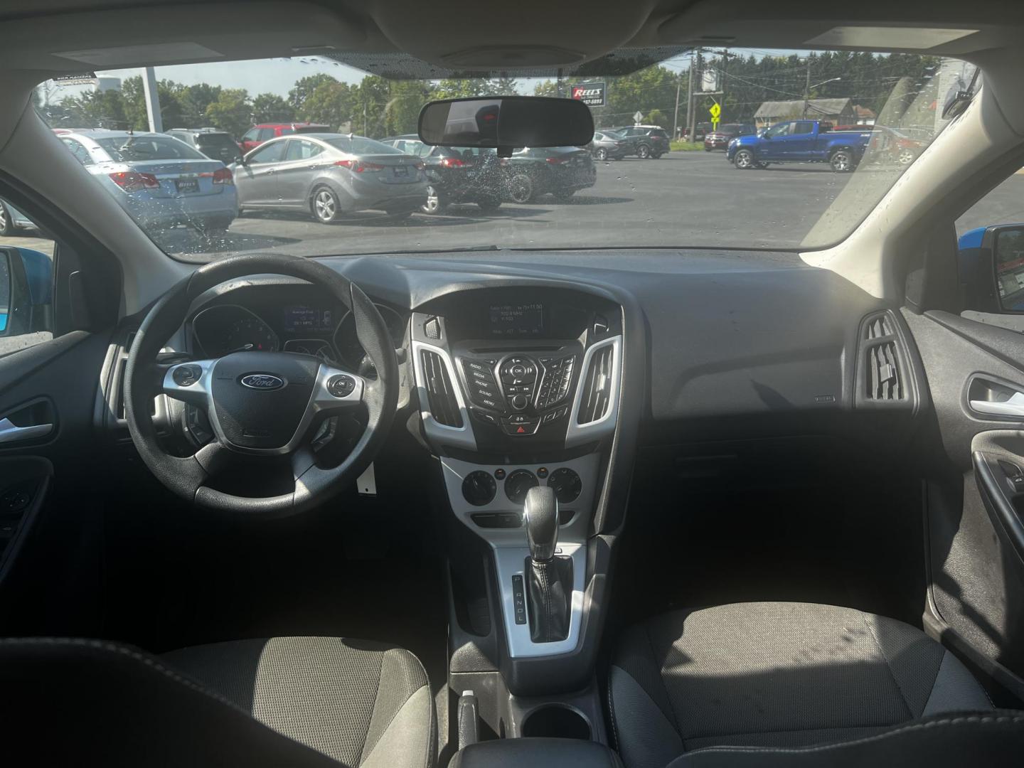 2013 Blue /Black Ford Focus SE Sedan (1FADP3F29DL) with an 2.0L I4 DOHC 16V engine, 6-Speed Automatic transmission, located at 547 E. Main St., Orwell, OH, 44076, (440) 437-5893, 41.535435, -80.847855 - Photo#31