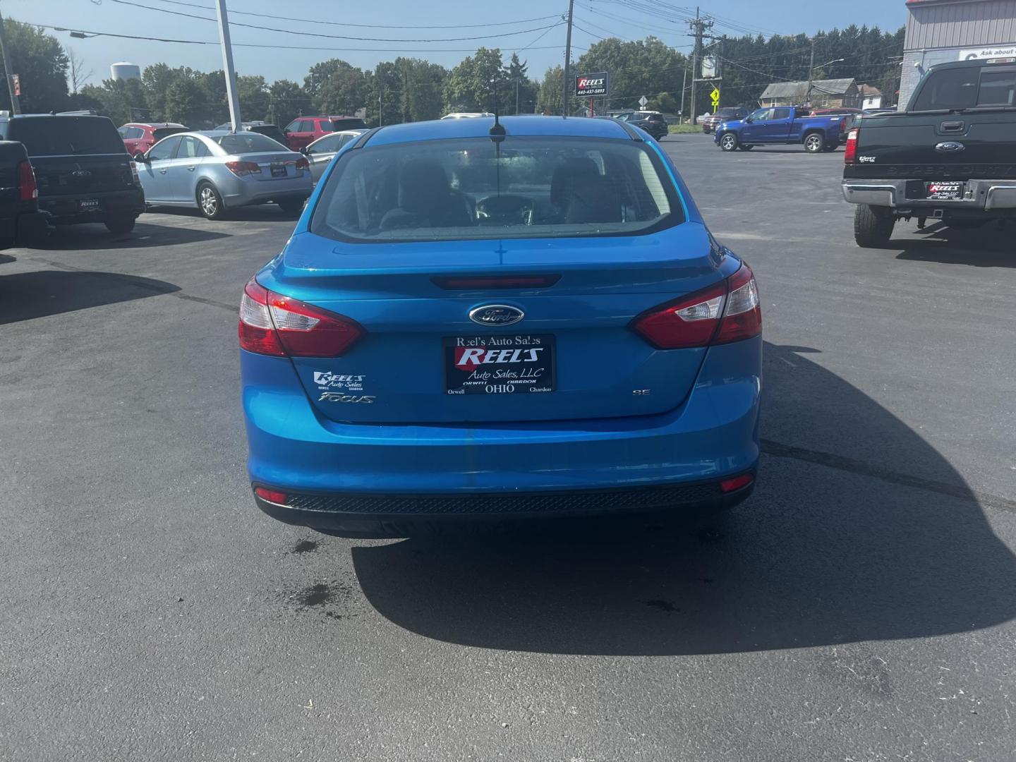 2013 Blue /Black Ford Focus SE Sedan (1FADP3F29DL) with an 2.0L I4 DOHC 16V engine, 6-Speed Automatic transmission, located at 547 E. Main St., Orwell, OH, 44076, (440) 437-5893, 41.535435, -80.847855 - Photo#8