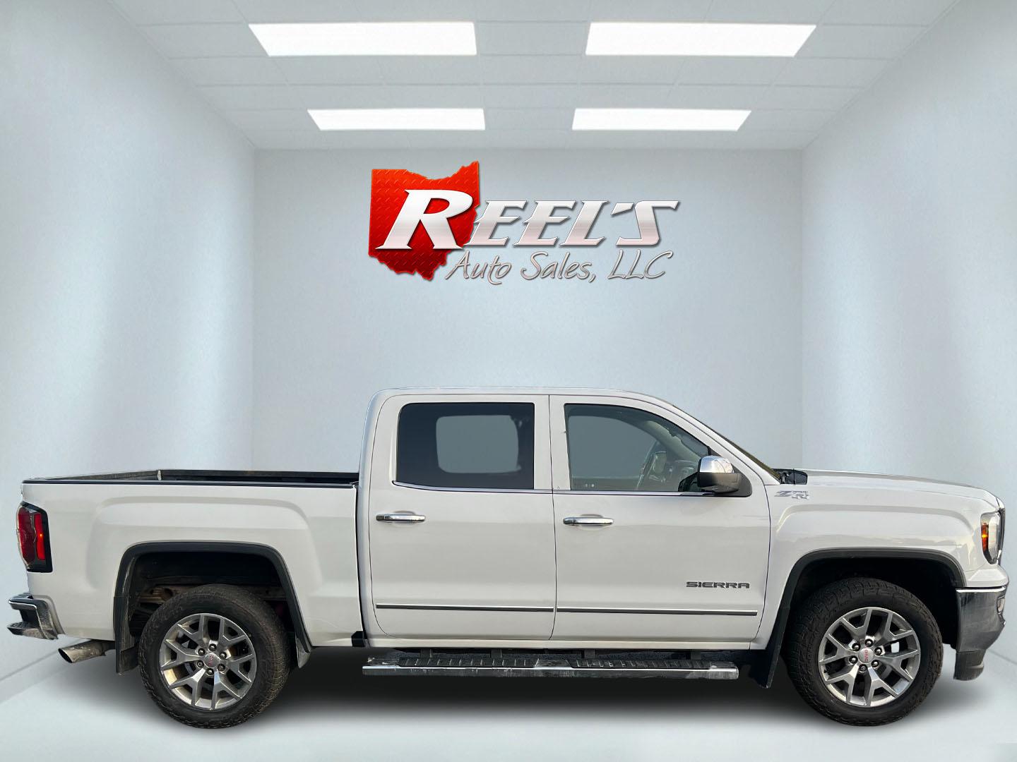 2018 White /Black GMC Sierra 1500 SLT Crew Cab Short Box 4WD (3GTU2NEC3JG) with an 5.3L V8 OHV 16V engine, 8-Speed Automatic transmission, located at 547 E. Main St., Orwell, OH, 44076, (440) 437-5893, 41.535435, -80.847855 - This One Owner 2018 GMC Sierra 1500 SLT Crew Cab is a versatile and powerful pickup truck, featuring a 5.3L Vortec V8 engine paired with an 8-speed automatic transmission and 3.42 gearing, allowing for robust performance and a towing capacity of 9,100 pounds. Designed for both comfort and utility, i - Photo#4