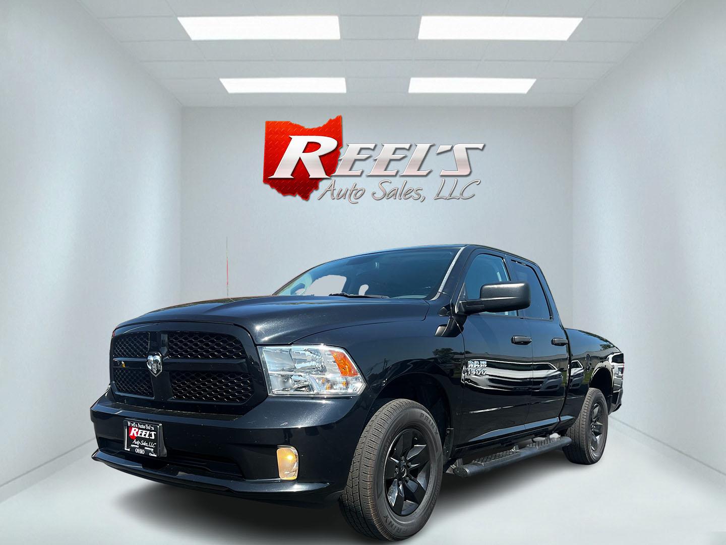 2016 Black /Black RAM 1500 Express Quad Cab 4WD (1C6RR7FG8GS) with an 3.6L V6 DOHC 24V FFV engine, 8-Speed Automatic transmission, located at 547 E. Main St., Orwell, OH, 44076, (440) 437-5893, 41.535435, -80.847855 - This 2016 Ram 1500 Express Quad Cab 4WD is a practical and efficient option for those needing a reliable pickup truck. It is powered by a 3.6L Pentastar V6 engine and paired with an 8-speed automatic transmission, offering a balance of power and fuel efficiency with its 23 MPG highway rating. The tr - Photo#0