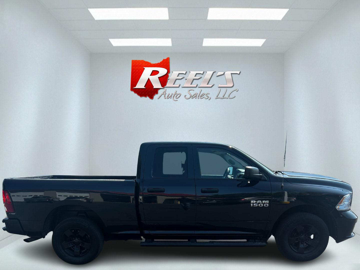 2016 Black /Black RAM 1500 Express Quad Cab 4WD (1C6RR7FG8GS) with an 3.6L V6 DOHC 24V FFV engine, 8-Speed Automatic transmission, located at 547 E. Main St., Orwell, OH, 44076, (440) 437-5893, 41.535435, -80.847855 - This 2016 Ram 1500 Express Quad Cab 4WD is a practical and efficient option for those needing a reliable pickup truck. It is powered by a 3.6L Pentastar V6 engine and paired with an 8-speed automatic transmission, offering a balance of power and fuel efficiency with its 23 MPG highway rating. The tr - Photo#4