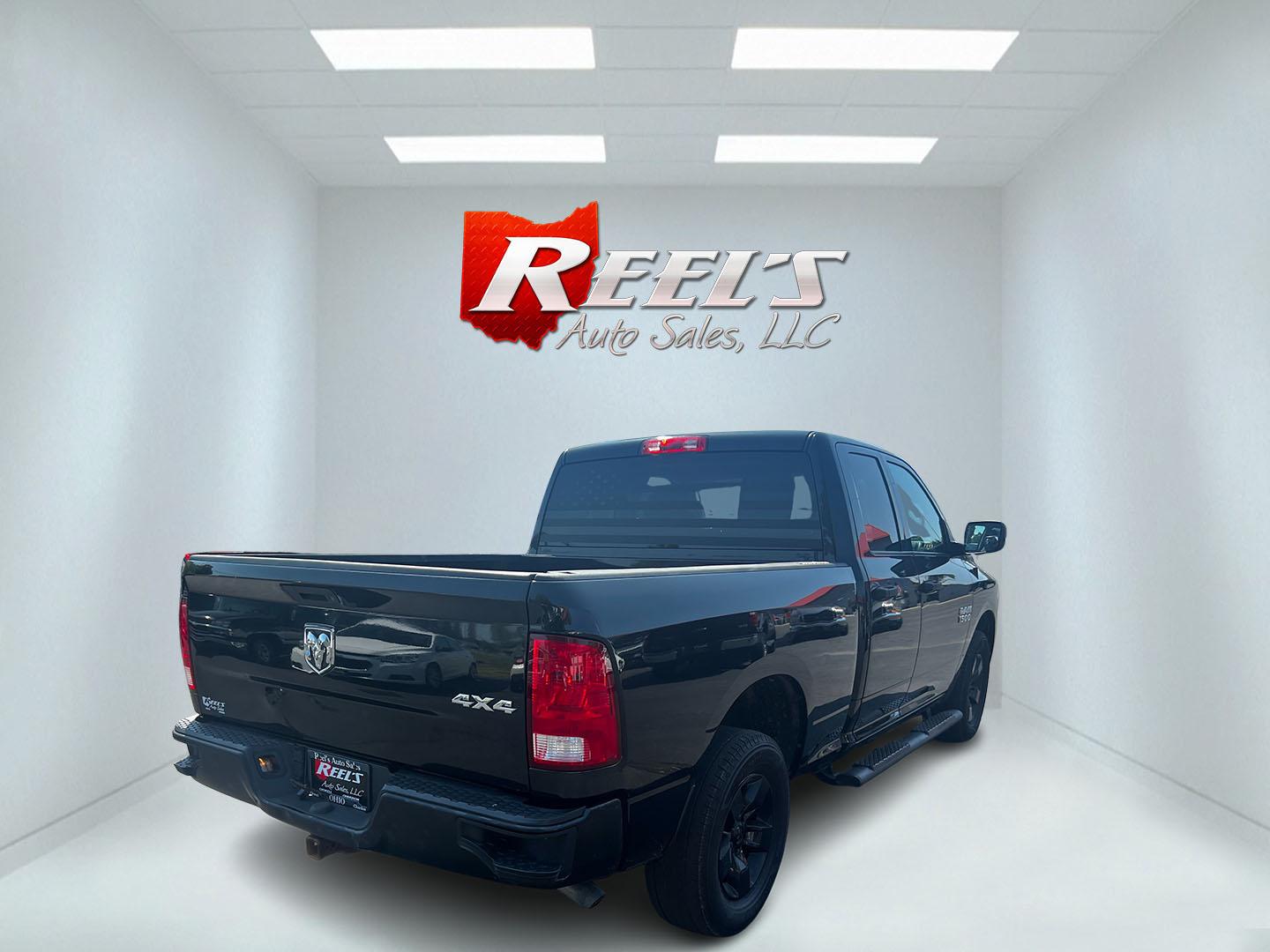 2016 Black /Black RAM 1500 Express Quad Cab 4WD (1C6RR7FG8GS) with an 3.6L V6 DOHC 24V FFV engine, 8-Speed Automatic transmission, located at 547 E. Main St., Orwell, OH, 44076, (440) 437-5893, 41.535435, -80.847855 - This 2016 Ram 1500 Express Quad Cab 4WD is a practical and efficient option for those needing a reliable pickup truck. It is powered by a 3.6L Pentastar V6 engine and paired with an 8-speed automatic transmission, offering a balance of power and fuel efficiency with its 23 MPG highway rating. The tr - Photo#5