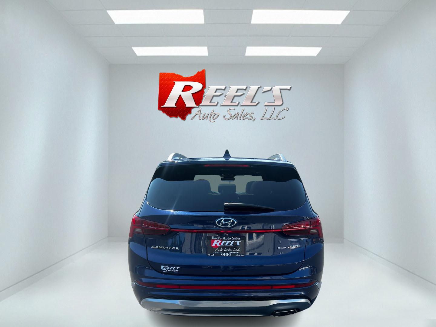 2021 Blue /Brown Hyundai Santa Fe Calligraphy AWD (5NMS5DAL3MH) with an 2.5L I4 DOHC 16V Turbo engine, 8-Speed Automatic transmission, located at 11115 Chardon Rd. , Chardon, OH, 44024, (440) 214-9705, 41.580246, -81.241943 - Photo#6