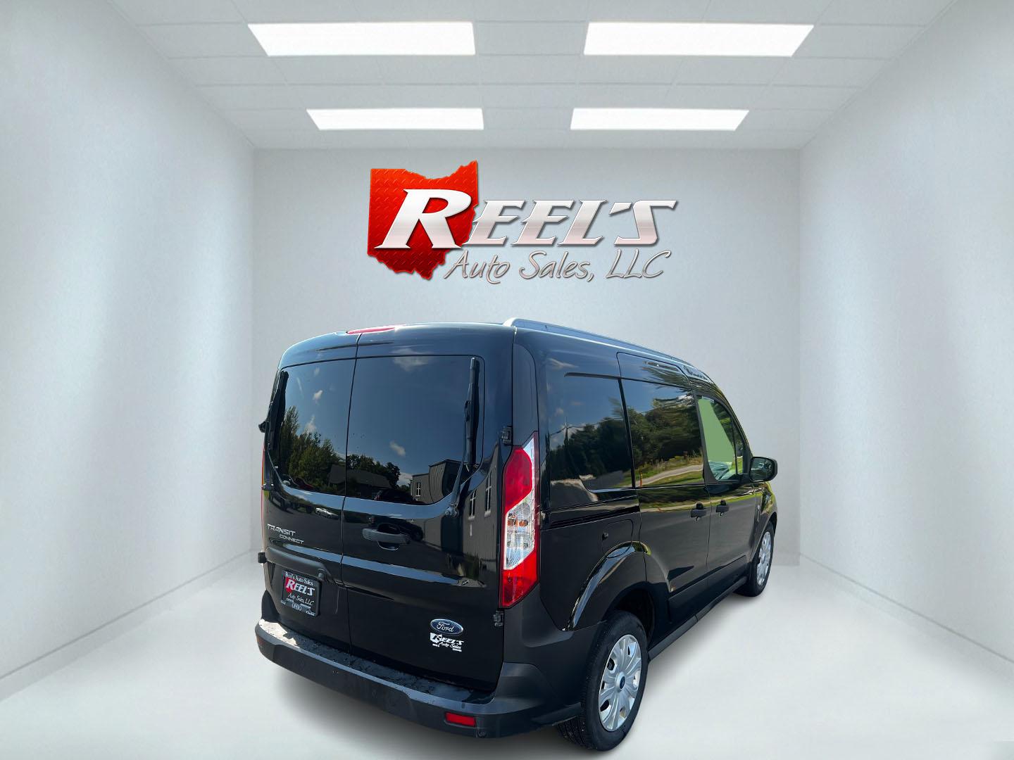 2019 Black /Black Ford Transit Connect Cargo Van XL SWB w/Rear 180 Degree Door (NM0LS6E22K1) with an 2.0L I4 DOHC 16V engine, 8-Speed Automatic transmission, located at 11115 Chardon Rd. , Chardon, OH, 44024, (440) 214-9705, 41.580246, -81.241943 - This One Owner 2019 Ford Transit Connect Cargo Van is a practical and efficient choice for businesses or individuals requiring a reliable work vehicle. It is equipped with a 2.0-liter I4 engine and an 8-speed automatic transmission, offering a balance of power and fuel efficiency with a highway rati - Photo#5