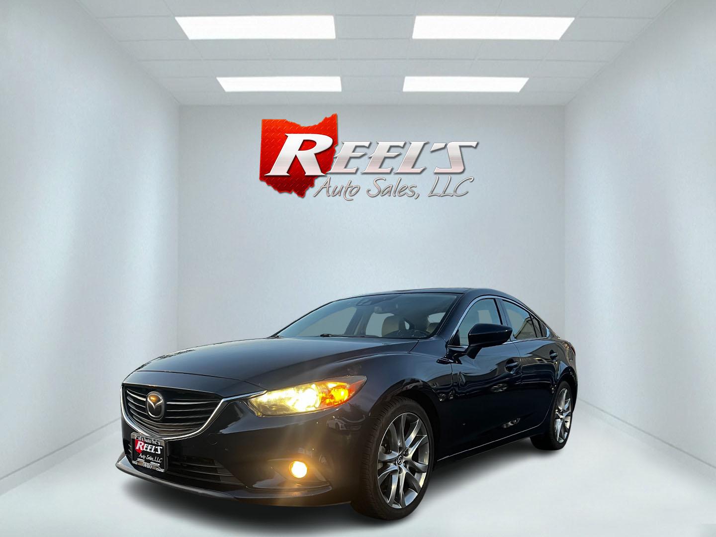 2015 Blue /Tan Mazda Mazda6 i Grand Touring (JM1GJ1W52F1) with an 2.5L I4 DOHC 16V engine, 6-Speed Automatic transmission, located at 11115 Chardon Rd. , Chardon, OH, 44024, (440) 214-9705, 41.580246, -81.241943 - This One Owner 2015 Mazda6 Grand Touring is a mid-sized sedan that combines performance, luxury, and technology. Powered by a 2.5-liter I4 engine paired with a 6-speed automatic transmission, it provides a smooth and efficient drive, boasting an impressive 39 MPG on the highway. The interior is well - Photo#0