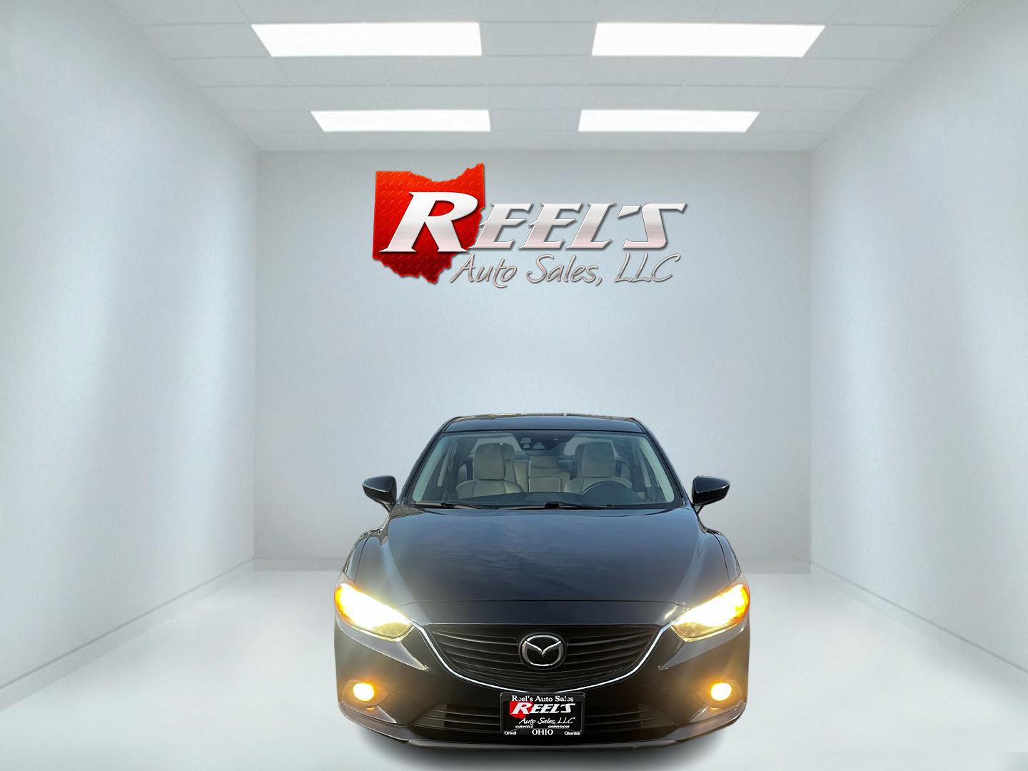 2015 Blue /Tan Mazda Mazda6 i Grand Touring (JM1GJ1W52F1) with an 2.5L I4 DOHC 16V engine, 6-Speed Automatic transmission, located at 11115 Chardon Rd. , Chardon, OH, 44024, (440) 214-9705, 41.580246, -81.241943 - This One Owner 2015 Mazda6 Grand Touring is a mid-sized sedan that combines performance, luxury, and technology. Powered by a 2.5-liter I4 engine paired with a 6-speed automatic transmission, it provides a smooth and efficient drive, boasting an impressive 39 MPG on the highway. The interior is well - Photo#1