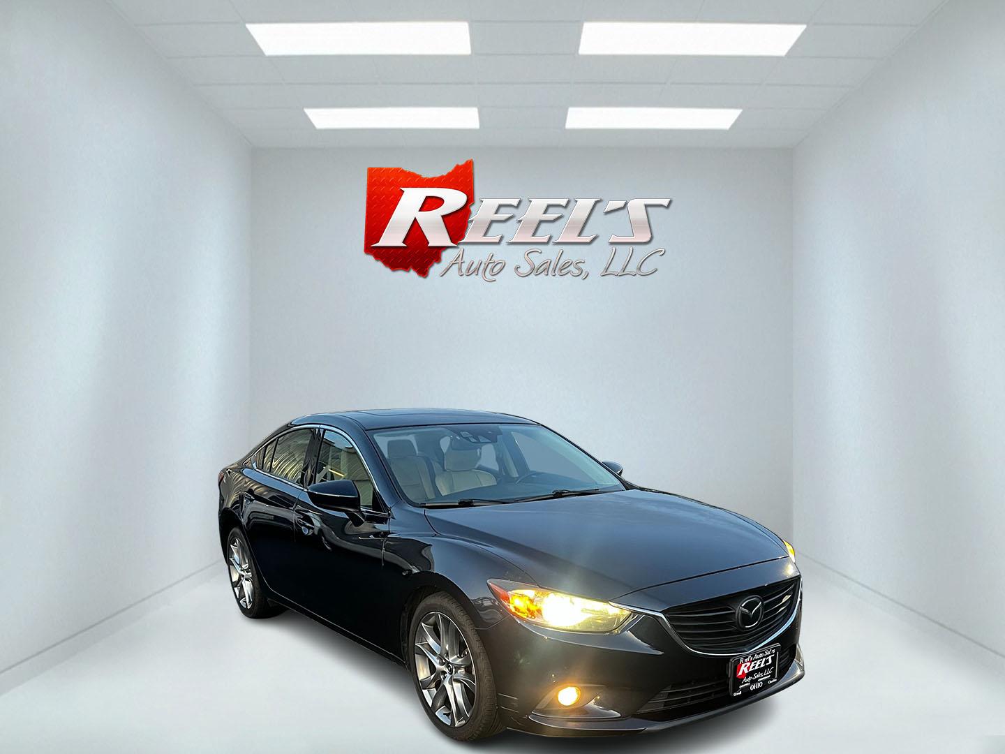 2015 Blue /Tan Mazda Mazda6 i Grand Touring (JM1GJ1W52F1) with an 2.5L I4 DOHC 16V engine, 6-Speed Automatic transmission, located at 11115 Chardon Rd. , Chardon, OH, 44024, (440) 214-9705, 41.580246, -81.241943 - This One Owner 2015 Mazda6 Grand Touring is a mid-sized sedan that combines performance, luxury, and technology. Powered by a 2.5-liter I4 engine paired with a 6-speed automatic transmission, it provides a smooth and efficient drive, boasting an impressive 39 MPG on the highway. The interior is well - Photo#2