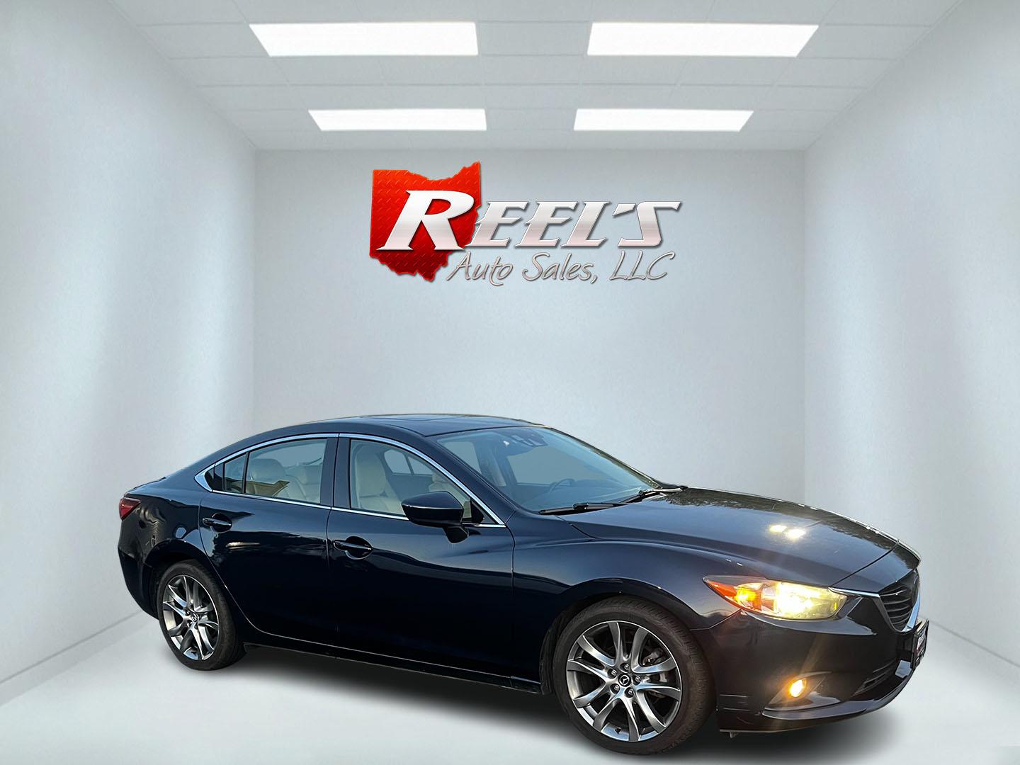 2015 Blue /Tan Mazda Mazda6 i Grand Touring (JM1GJ1W52F1) with an 2.5L I4 DOHC 16V engine, 6-Speed Automatic transmission, located at 11115 Chardon Rd. , Chardon, OH, 44024, (440) 214-9705, 41.580246, -81.241943 - This One Owner 2015 Mazda6 Grand Touring is a mid-sized sedan that combines performance, luxury, and technology. Powered by a 2.5-liter I4 engine paired with a 6-speed automatic transmission, it provides a smooth and efficient drive, boasting an impressive 39 MPG on the highway. The interior is well - Photo#3