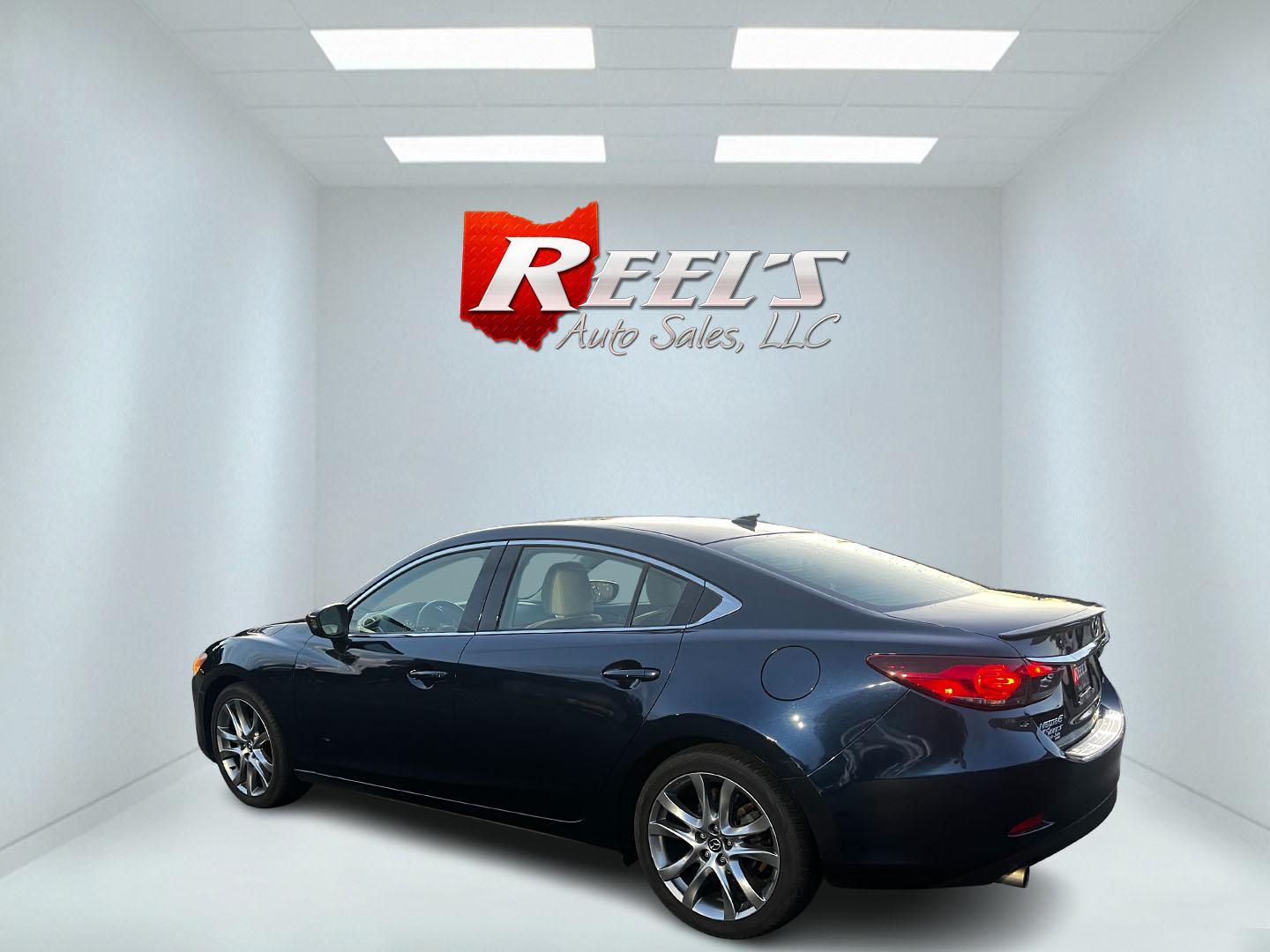 2015 Blue /Tan Mazda Mazda6 i Grand Touring (JM1GJ1W52F1) with an 2.5L I4 DOHC 16V engine, 6-Speed Automatic transmission, located at 11115 Chardon Rd. , Chardon, OH, 44024, (440) 214-9705, 41.580246, -81.241943 - This One Owner 2015 Mazda6 Grand Touring is a mid-sized sedan that combines performance, luxury, and technology. Powered by a 2.5-liter I4 engine paired with a 6-speed automatic transmission, it provides a smooth and efficient drive, boasting an impressive 39 MPG on the highway. The interior is well - Photo#8