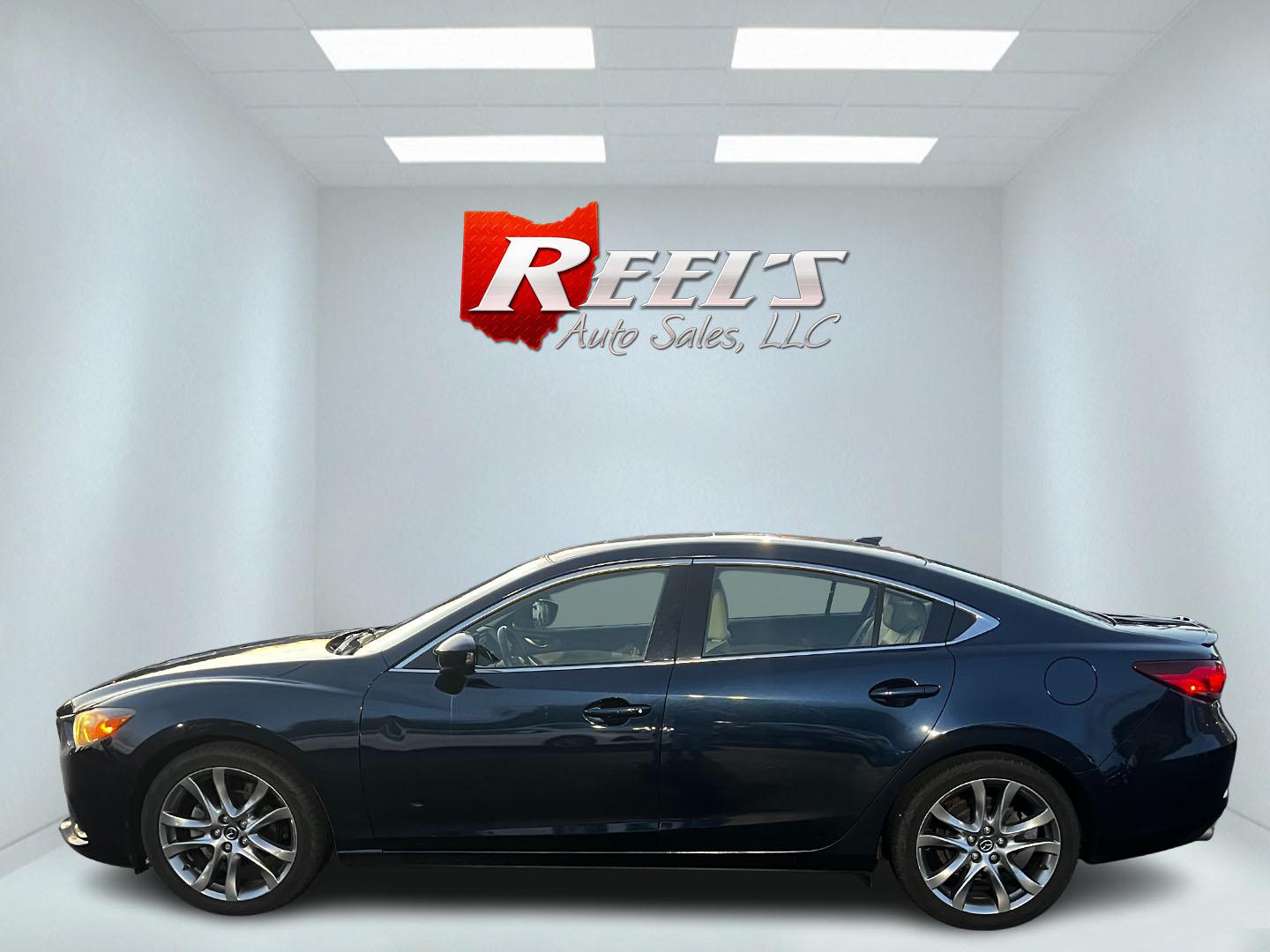 2015 Blue /Tan Mazda Mazda6 i Grand Touring (JM1GJ1W52F1) with an 2.5L I4 DOHC 16V engine, 6-Speed Automatic transmission, located at 11115 Chardon Rd. , Chardon, OH, 44024, (440) 214-9705, 41.580246, -81.241943 - This One Owner 2015 Mazda6 Grand Touring is a mid-sized sedan that combines performance, luxury, and technology. Powered by a 2.5-liter I4 engine paired with a 6-speed automatic transmission, it provides a smooth and efficient drive, boasting an impressive 39 MPG on the highway. The interior is well - Photo#9