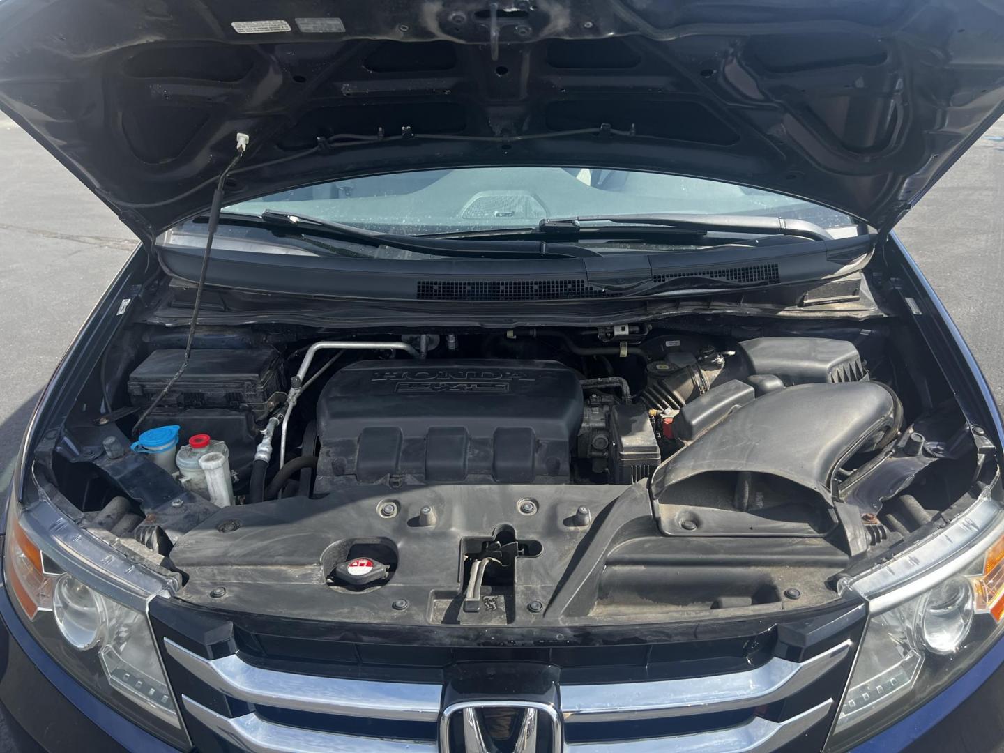 2014 Blue /Gray Honda Odyssey EX (5FNRL5H43EB) with an 3.5L V6 SOHC 24V engine, 6-Speed Automatic transmission, located at 547 E. Main St., Orwell, OH, 44076, (440) 437-5893, 41.535435, -80.847855 - Photo#14