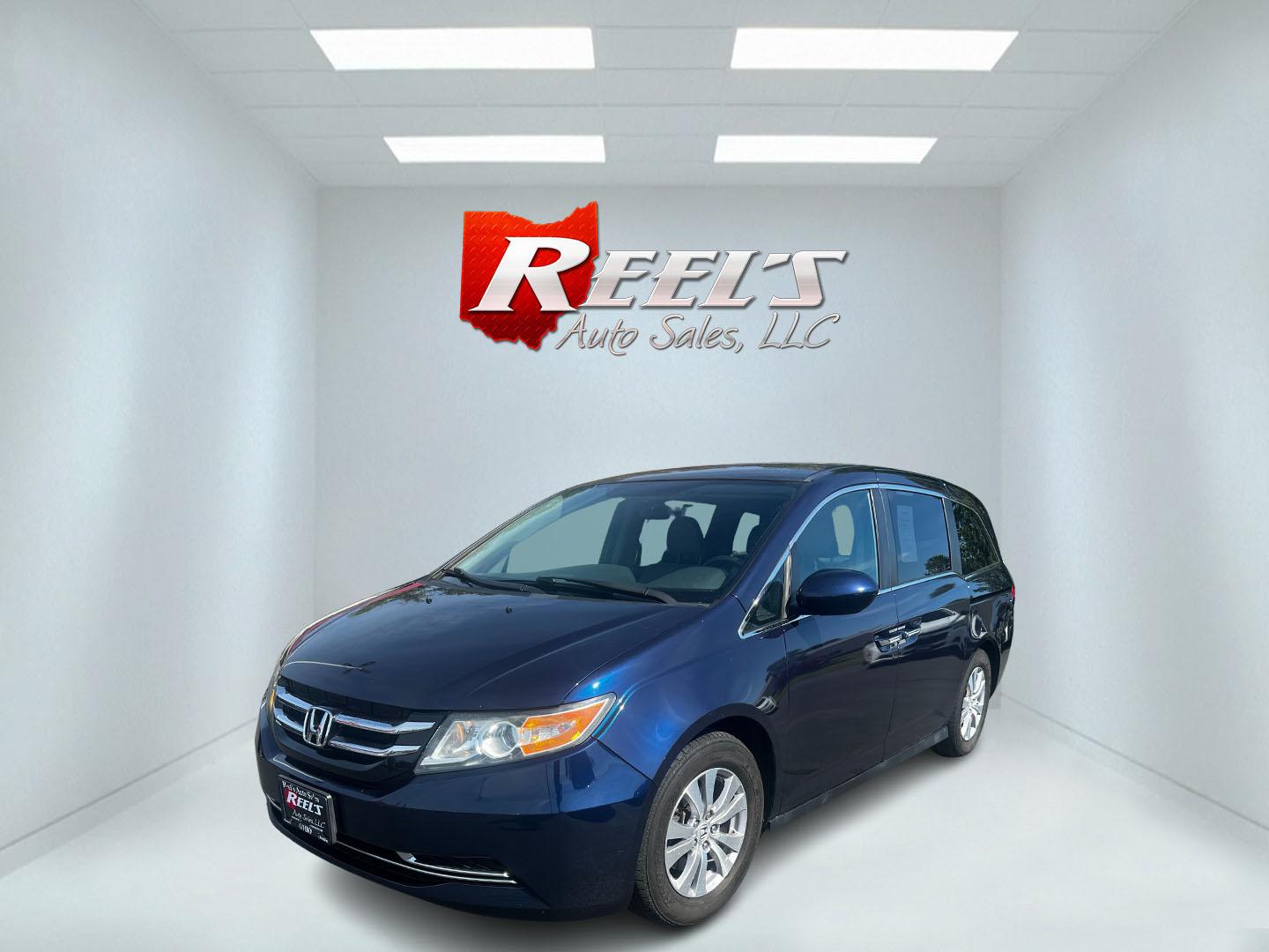 2014 Blue /Gray Honda Odyssey EX (5FNRL5H43EB) with an 3.5L V6 SOHC 24V engine, 6-Speed Automatic transmission, located at 547 E. Main St., Orwell, OH, 44076, (440) 437-5893, 41.535435, -80.847855 - Photo#0