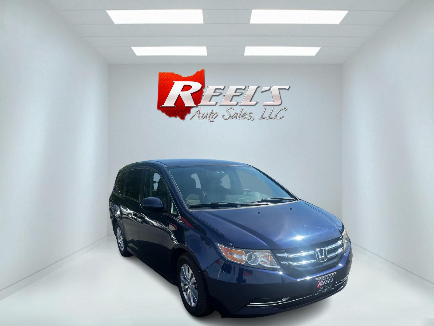 2014 Blue /Gray Honda Odyssey EX (5FNRL5H43EB) with an 3.5L V6 SOHC 24V engine, 6-Speed Automatic transmission, located at 547 E. Main St., Orwell, OH, 44076, (440) 437-5893, 41.535435, -80.847855 - Photo#2