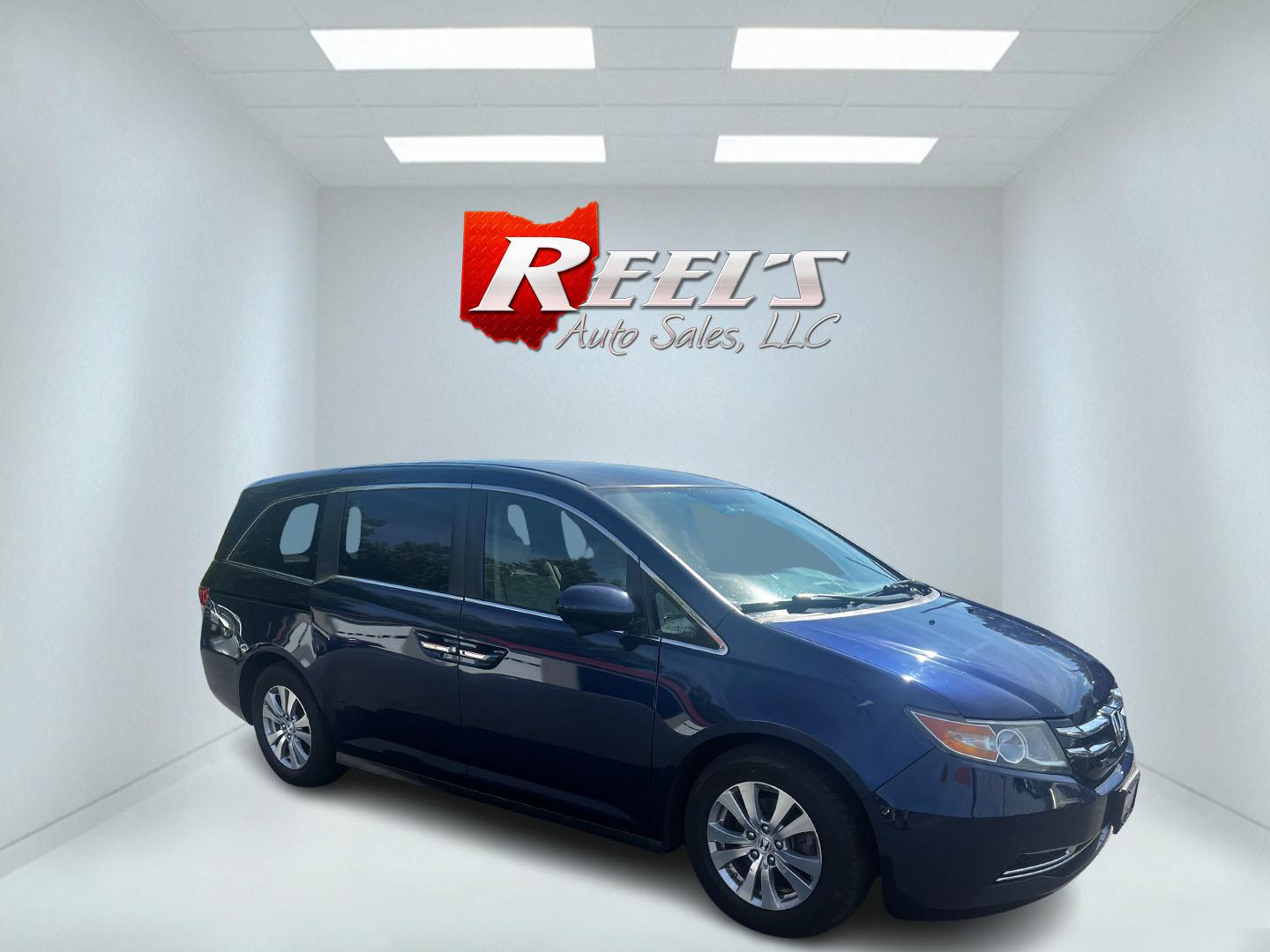 2014 Blue /Gray Honda Odyssey EX (5FNRL5H43EB) with an 3.5L V6 SOHC 24V engine, 6-Speed Automatic transmission, located at 547 E. Main St., Orwell, OH, 44076, (440) 437-5893, 41.535435, -80.847855 - Photo#3