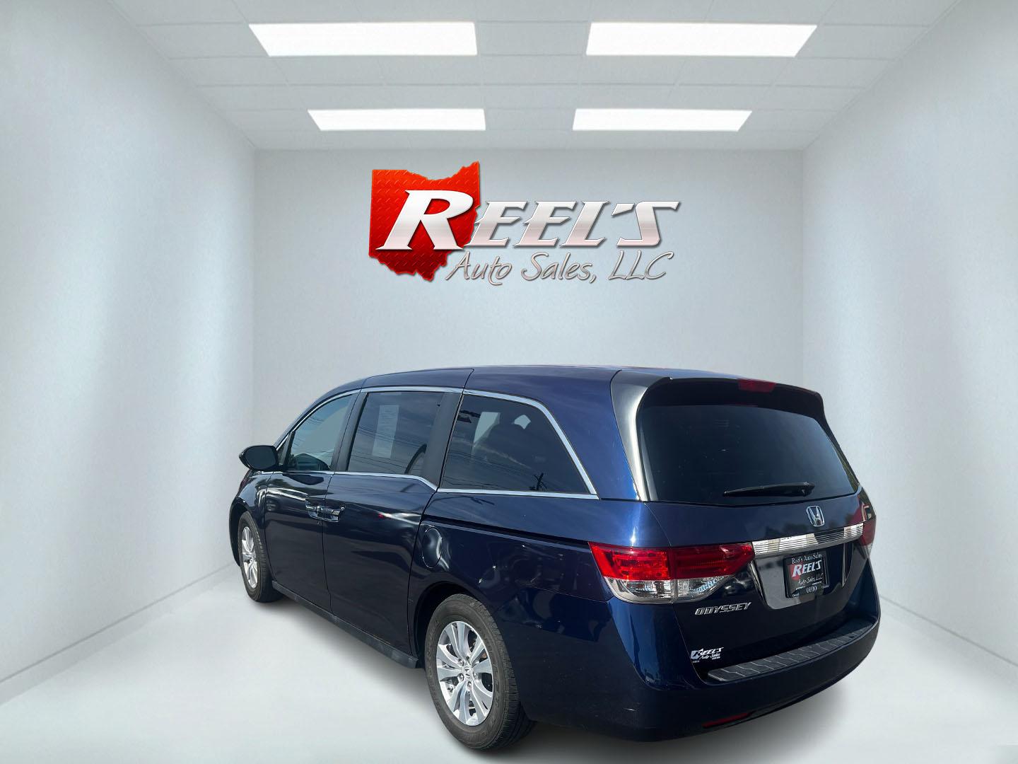 2014 Blue /Gray Honda Odyssey EX (5FNRL5H43EB) with an 3.5L V6 SOHC 24V engine, 6-Speed Automatic transmission, located at 547 E. Main St., Orwell, OH, 44076, (440) 437-5893, 41.535435, -80.847855 - Photo#7