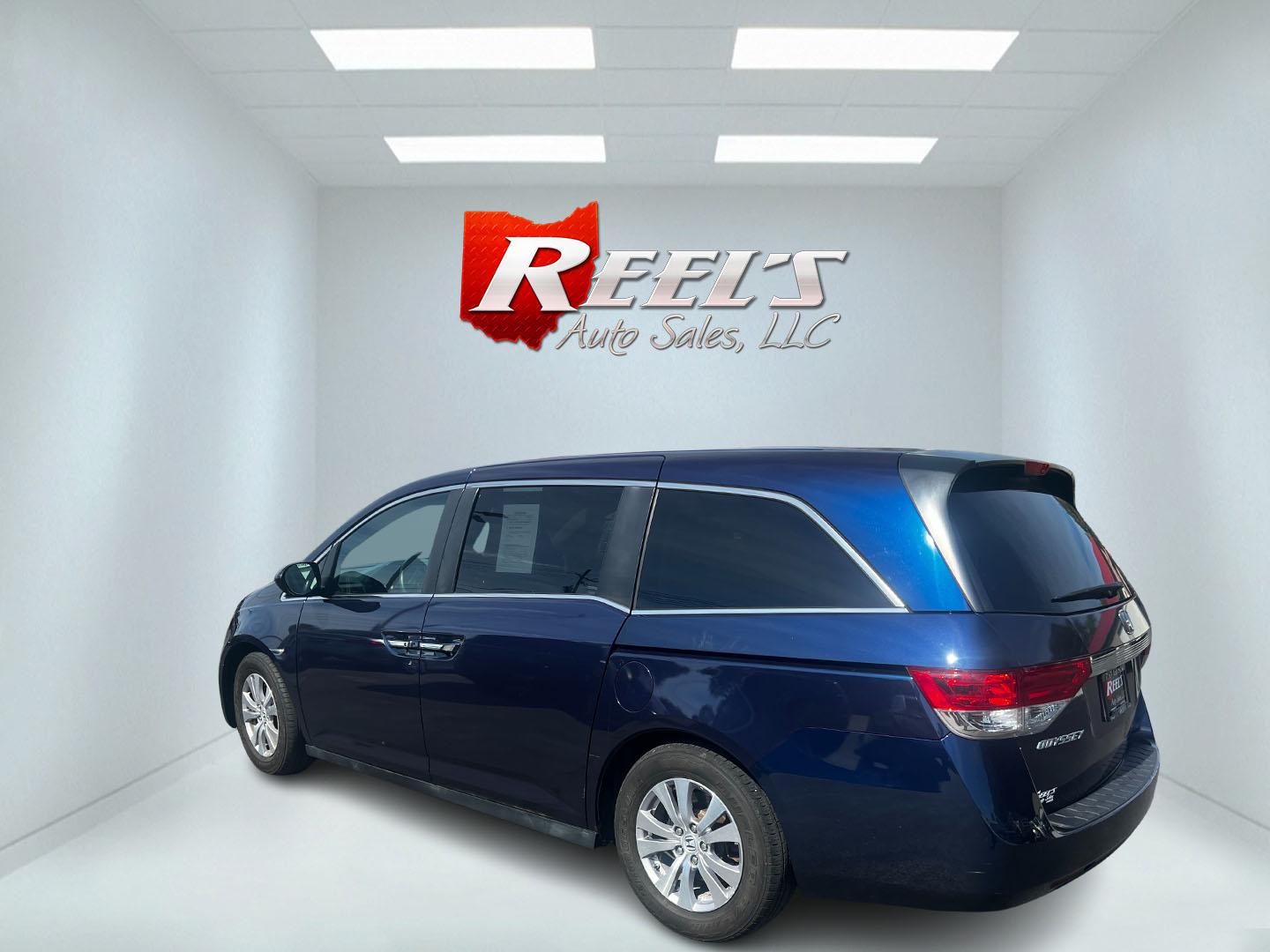 2014 Blue /Gray Honda Odyssey EX (5FNRL5H43EB) with an 3.5L V6 SOHC 24V engine, 6-Speed Automatic transmission, located at 547 E. Main St., Orwell, OH, 44076, (440) 437-5893, 41.535435, -80.847855 - Photo#8